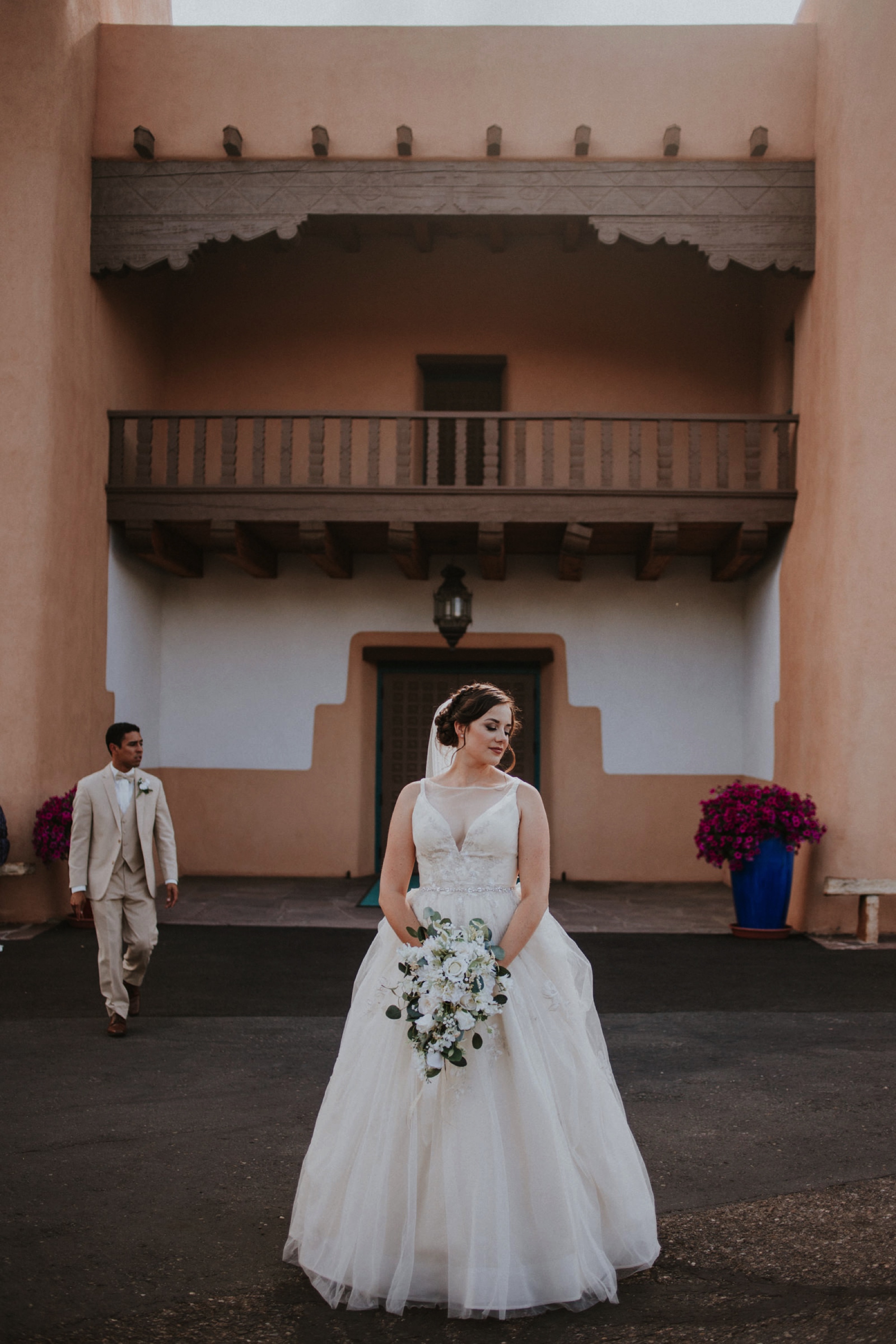  Katie and Frankie’s wedding was what Santa Fe summer wedding dreams are made of! They had a gorgeous catholic wedding ceremony at the Cristo Rey Catholic Church in Santa Fe, New Mexico followed by a fabulous travel-themed wedding reception at La Pos