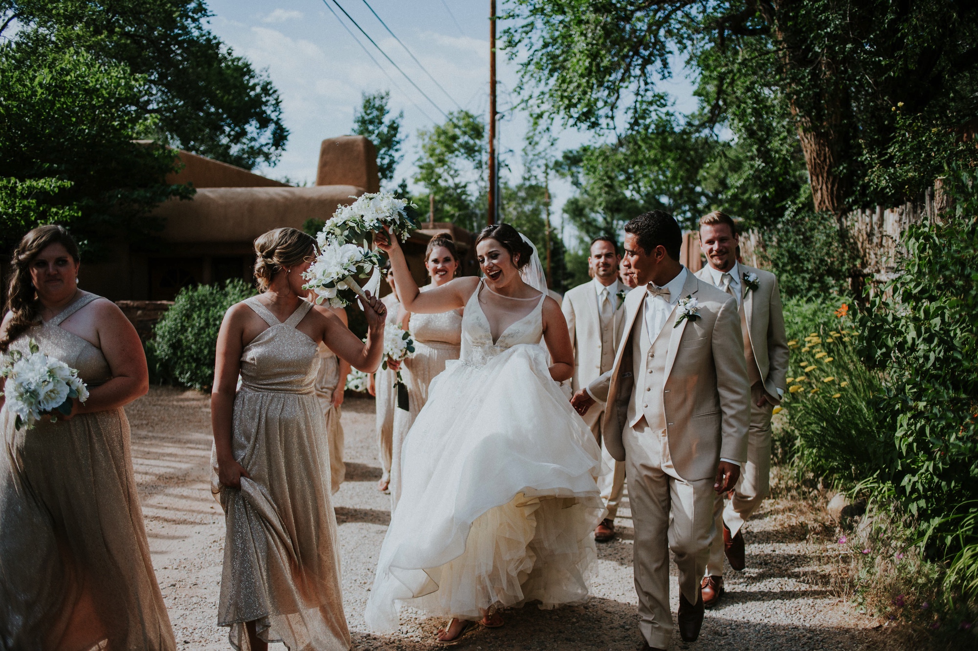  Katie and Frankie’s wedding was what Santa Fe summer wedding dreams are made of! They had a gorgeous catholic wedding ceremony at the Cristo Rey Catholic Church in Santa Fe, New Mexico followed by a fabulous travel-themed wedding reception at La Pos