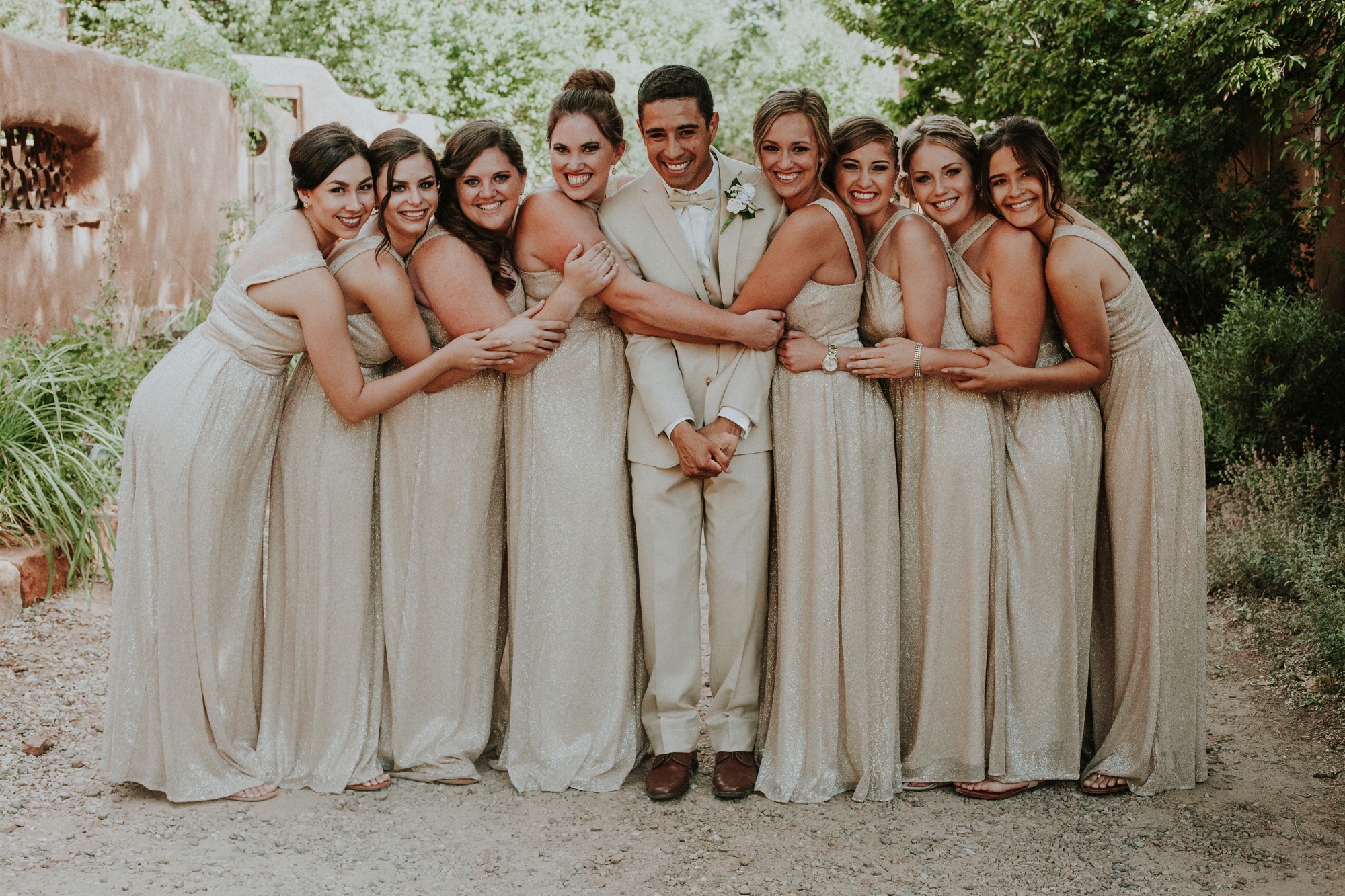  Katie and Frankie’s wedding was what Santa Fe summer wedding dreams are made of! They had a gorgeous catholic wedding ceremony at the Cristo Rey Catholic Church in Santa Fe, New Mexico followed by a fabulous travel-themed wedding reception at La Pos