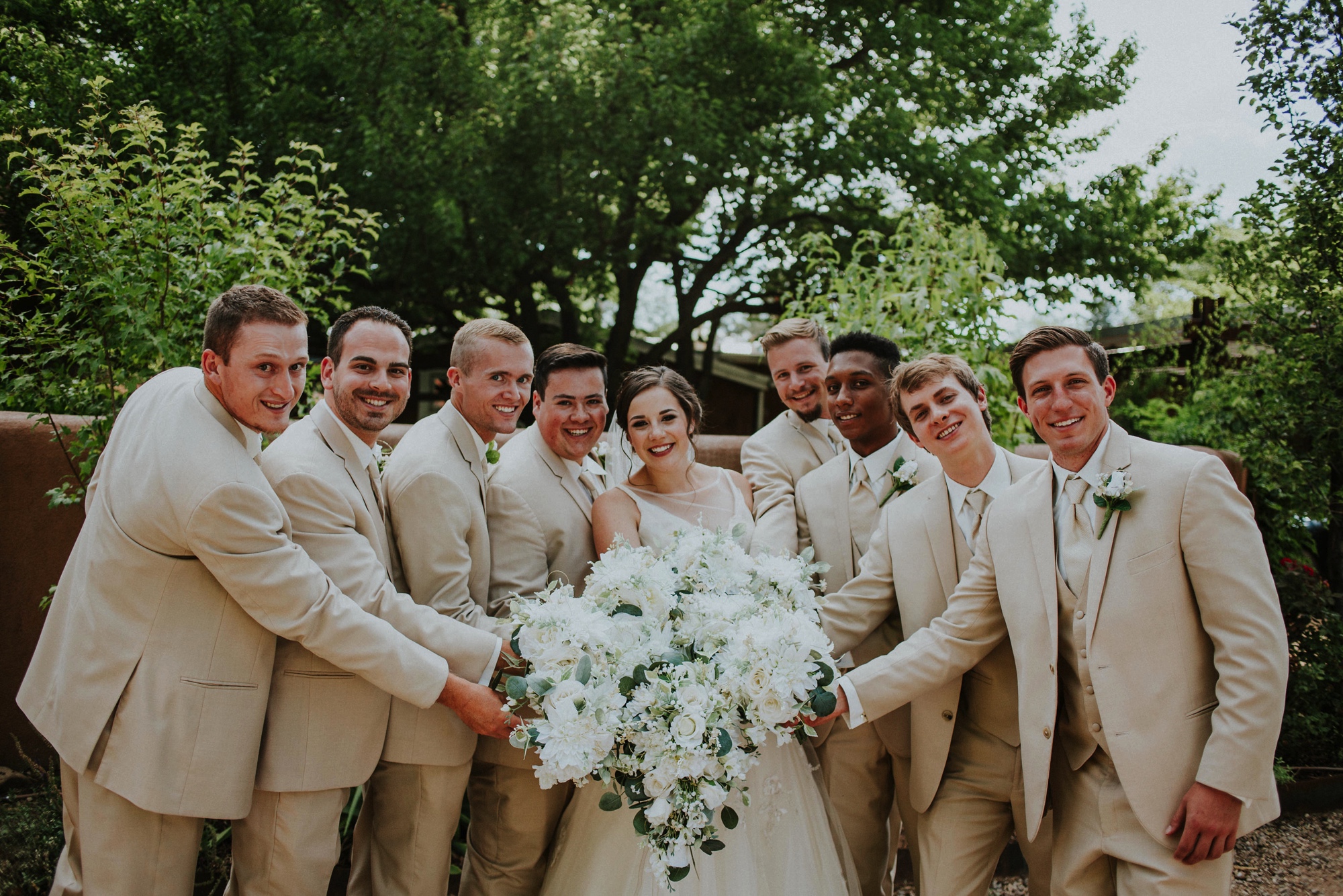  Katie and Frankie’s wedding was what Santa Fe summer wedding dreams are made of! They had a gorgeous catholic wedding ceremony at the Cristo Rey Catholic Church in Santa Fe, New Mexico followed by a fabulous travel-themed wedding reception at La Pos