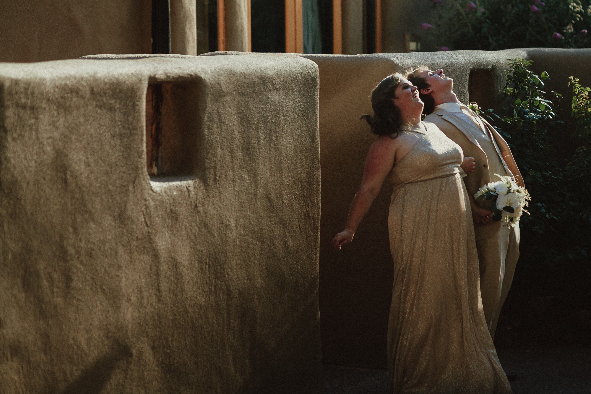  Katie and Frankie’s wedding was what Santa Fe summer wedding dreams are made of! They had a gorgeous catholic wedding ceremony at the Cristo Rey Catholic Church in Santa Fe, New Mexico followed by a fabulous travel-themed wedding reception at La Pos