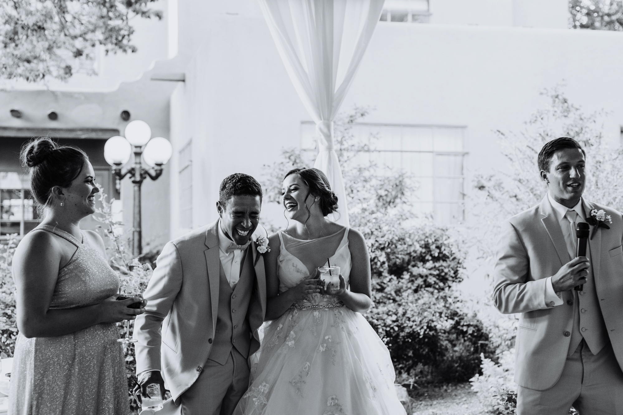  Katie and Frankie’s wedding was what Santa Fe summer wedding dreams are made of! They had a gorgeous catholic wedding ceremony at the Cristo Rey Catholic Church in Santa Fe, New Mexico followed by a fabulous travel-themed wedding reception at La Pos