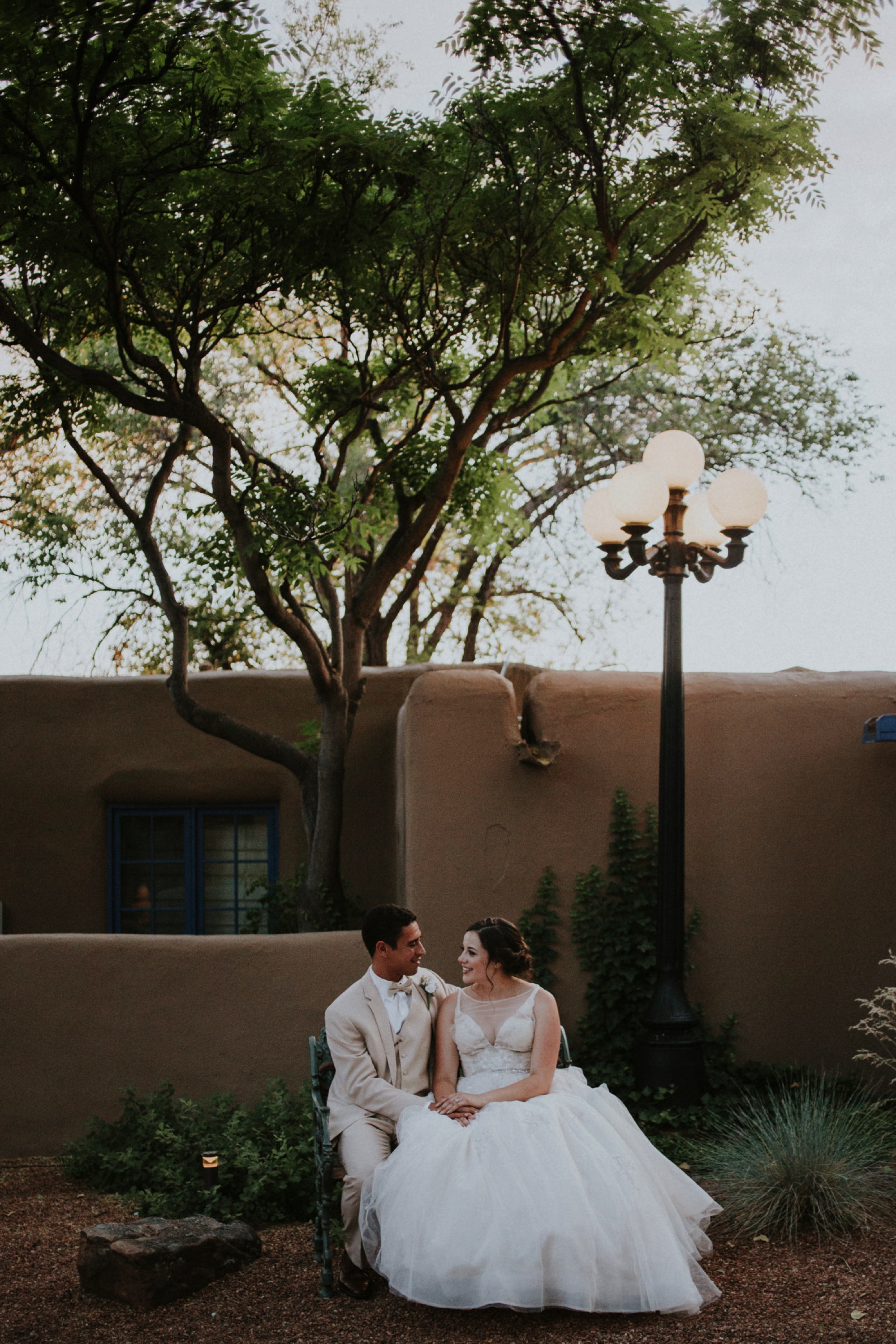  Katie and Frankie’s wedding was what Santa Fe summer wedding dreams are made of! They had a gorgeous catholic wedding ceremony at the Cristo Rey Catholic Church in Santa Fe, New Mexico followed by a fabulous travel-themed wedding reception at La Pos