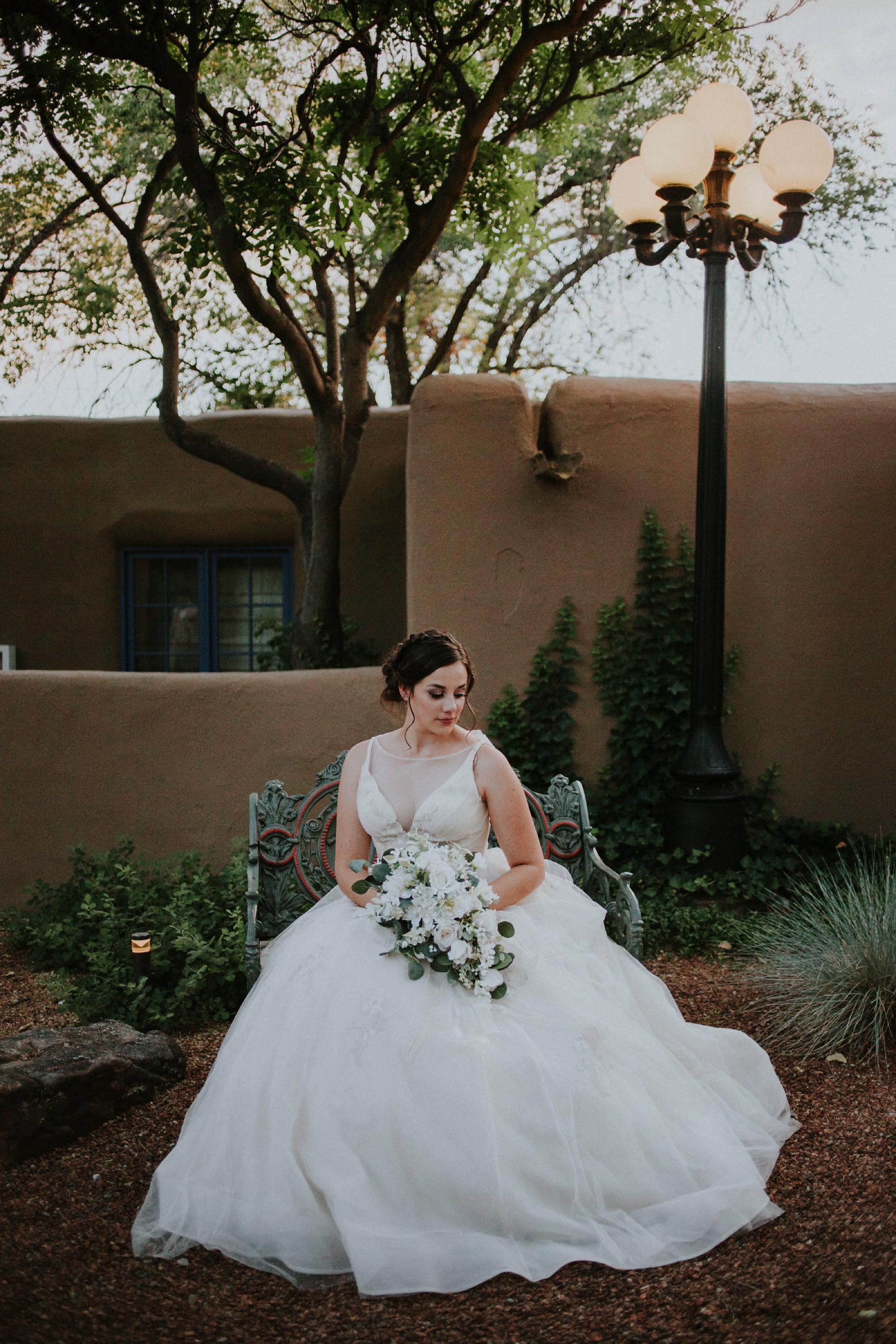  Katie and Frankie’s wedding was what Santa Fe summer wedding dreams are made of! They had a gorgeous catholic wedding ceremony at the Cristo Rey Catholic Church in Santa Fe, New Mexico followed by a fabulous travel-themed wedding reception at La Pos