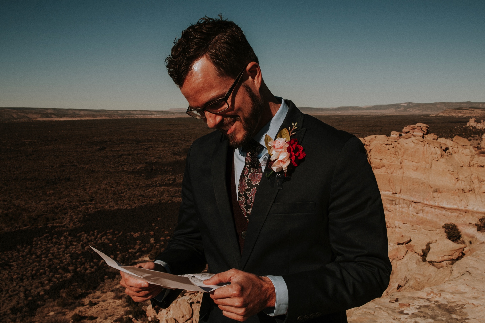  Jade and Alex eloped at the amazing and scenic El Malpais National Monument outside of Grants, New Mexico. It was a beautiful November day and the weather was crisp, fresh, and just a tad chilly, but it didn’t get in the way of their fabulous weddin