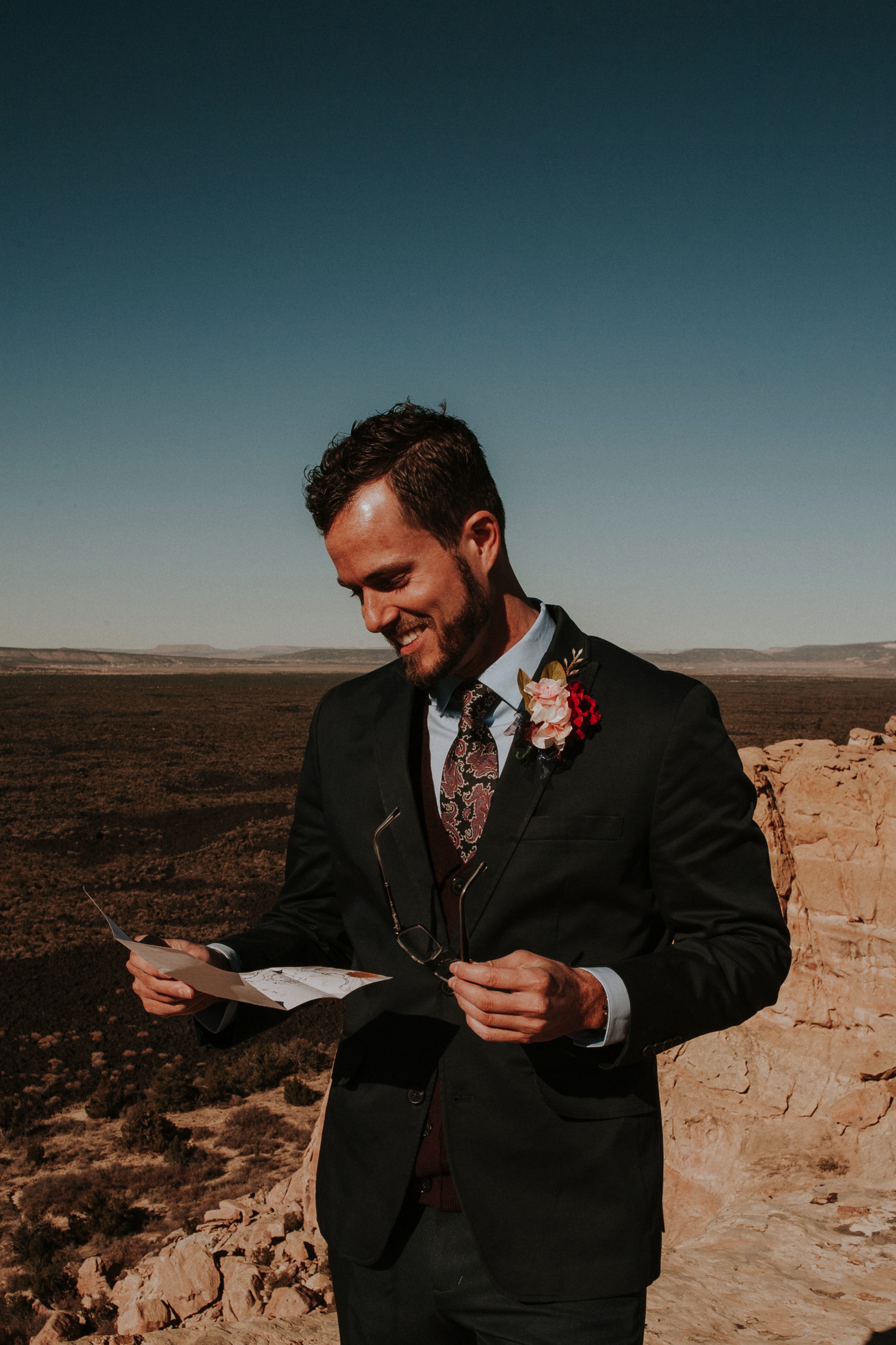  Jade and Alex eloped at the amazing and scenic El Malpais National Monument outside of Grants, New Mexico. It was a beautiful November day and the weather was crisp, fresh, and just a tad chilly, but it didn’t get in the way of their fabulous weddin