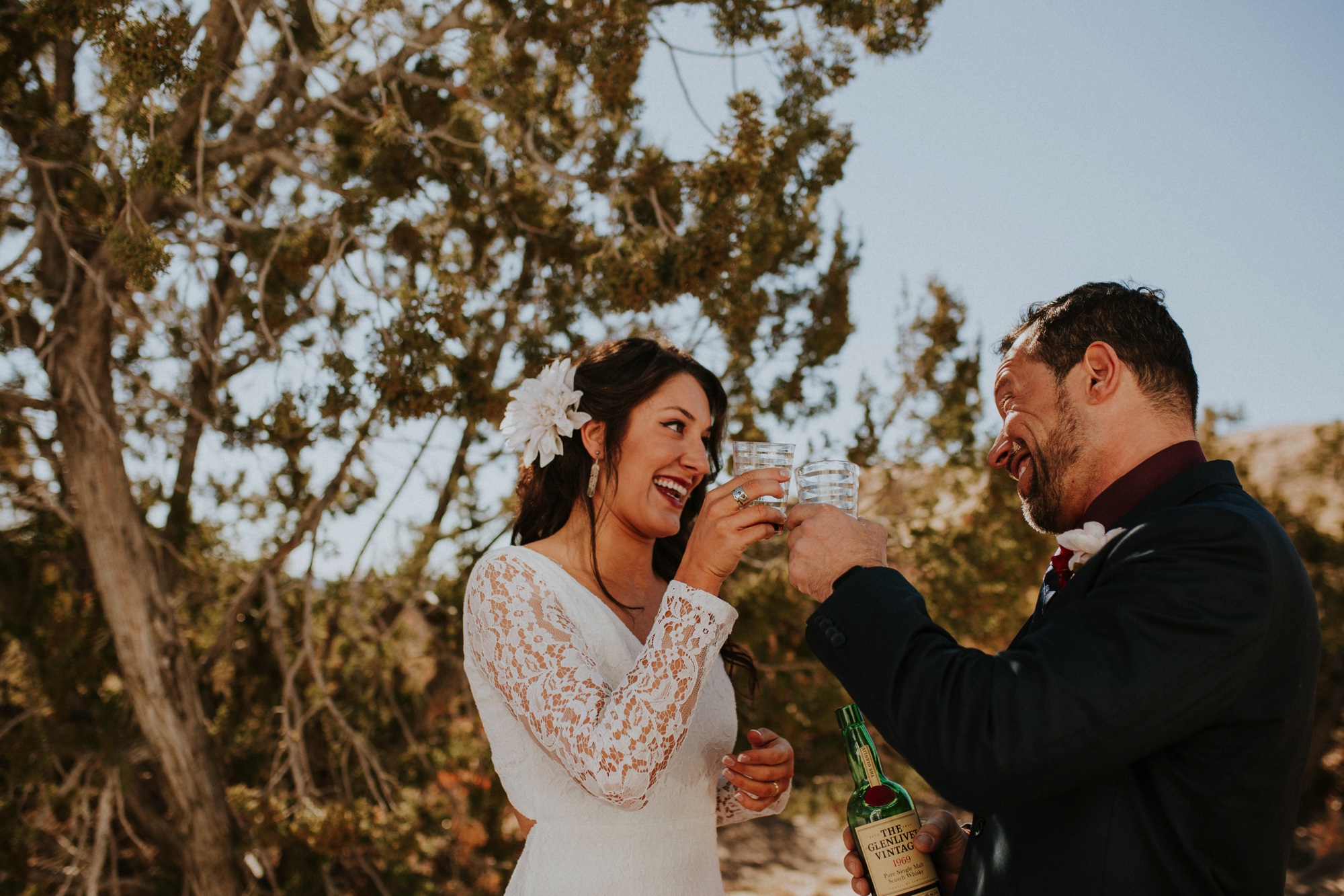  Jade and Alex eloped at the amazing and scenic El Malpais National Monument outside of Grants, New Mexico. It was a beautiful November day and the weather was crisp, fresh, and just a tad chilly, but it didn’t get in the way of their fabulous weddin