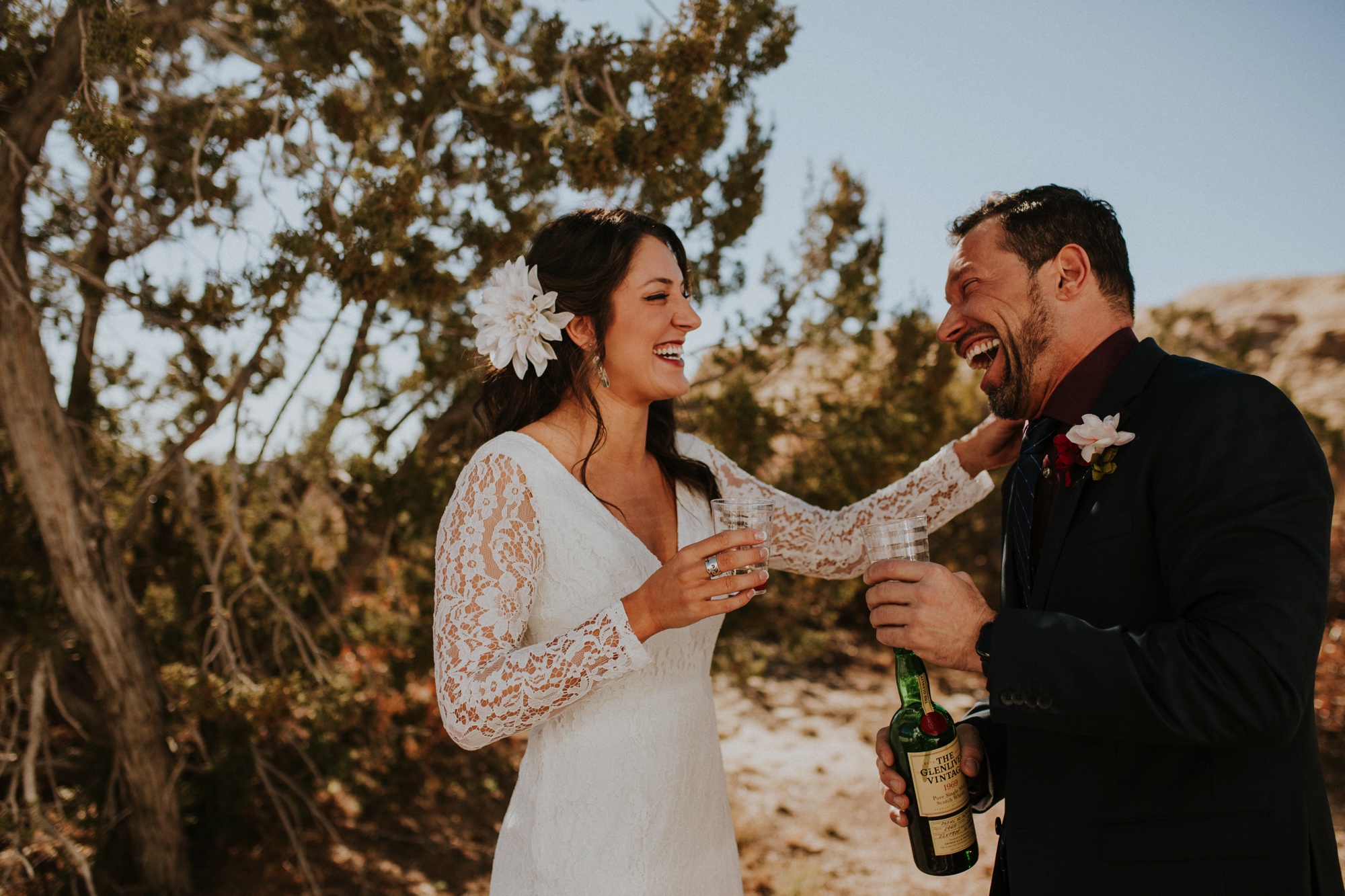  Jade and Alex eloped at the amazing and scenic El Malpais National Monument outside of Grants, New Mexico. It was a beautiful November day and the weather was crisp, fresh, and just a tad chilly, but it didn’t get in the way of their fabulous weddin