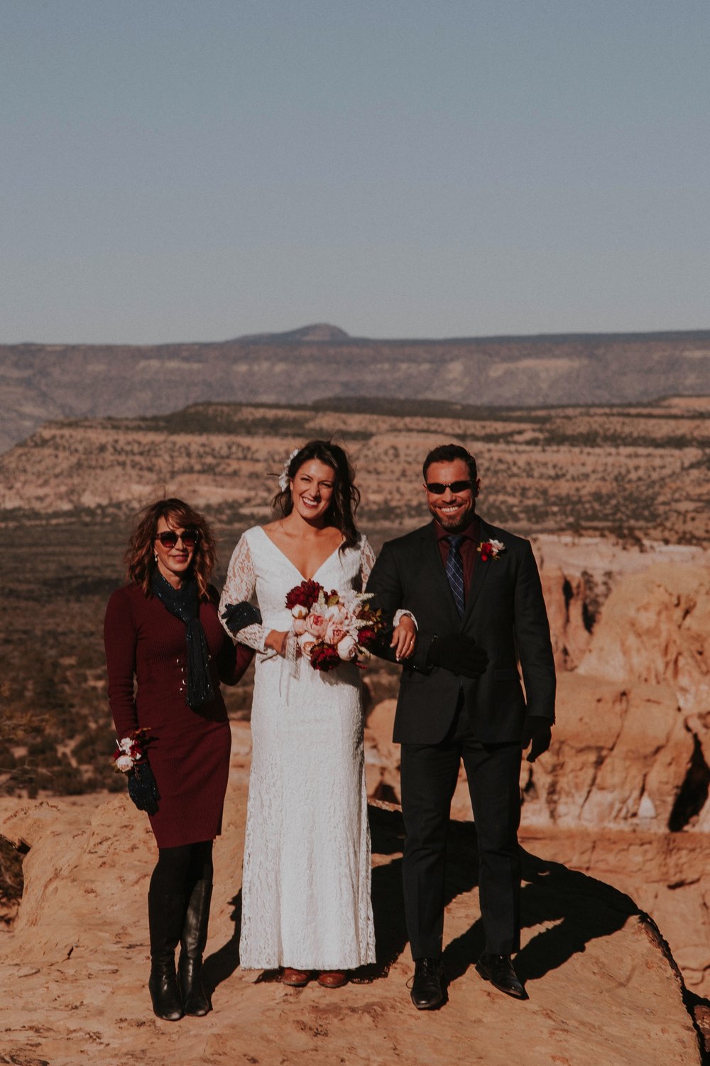  Jade and Alex eloped at the amazing and scenic El Malpais National Monument outside of Grants, New Mexico. It was a beautiful November day and the weather was crisp, fresh, and just a tad chilly, but it didn’t get in the way of their fabulous weddin