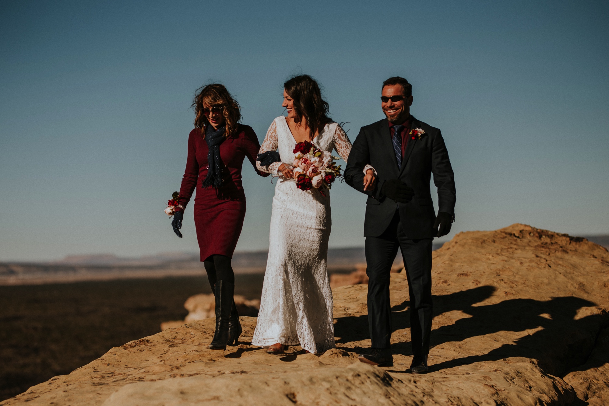  Jade and Alex eloped at the amazing and scenic El Malpais National Monument outside of Grants, New Mexico. It was a beautiful November day and the weather was crisp, fresh, and just a tad chilly, but it didn’t get in the way of their fabulous weddin