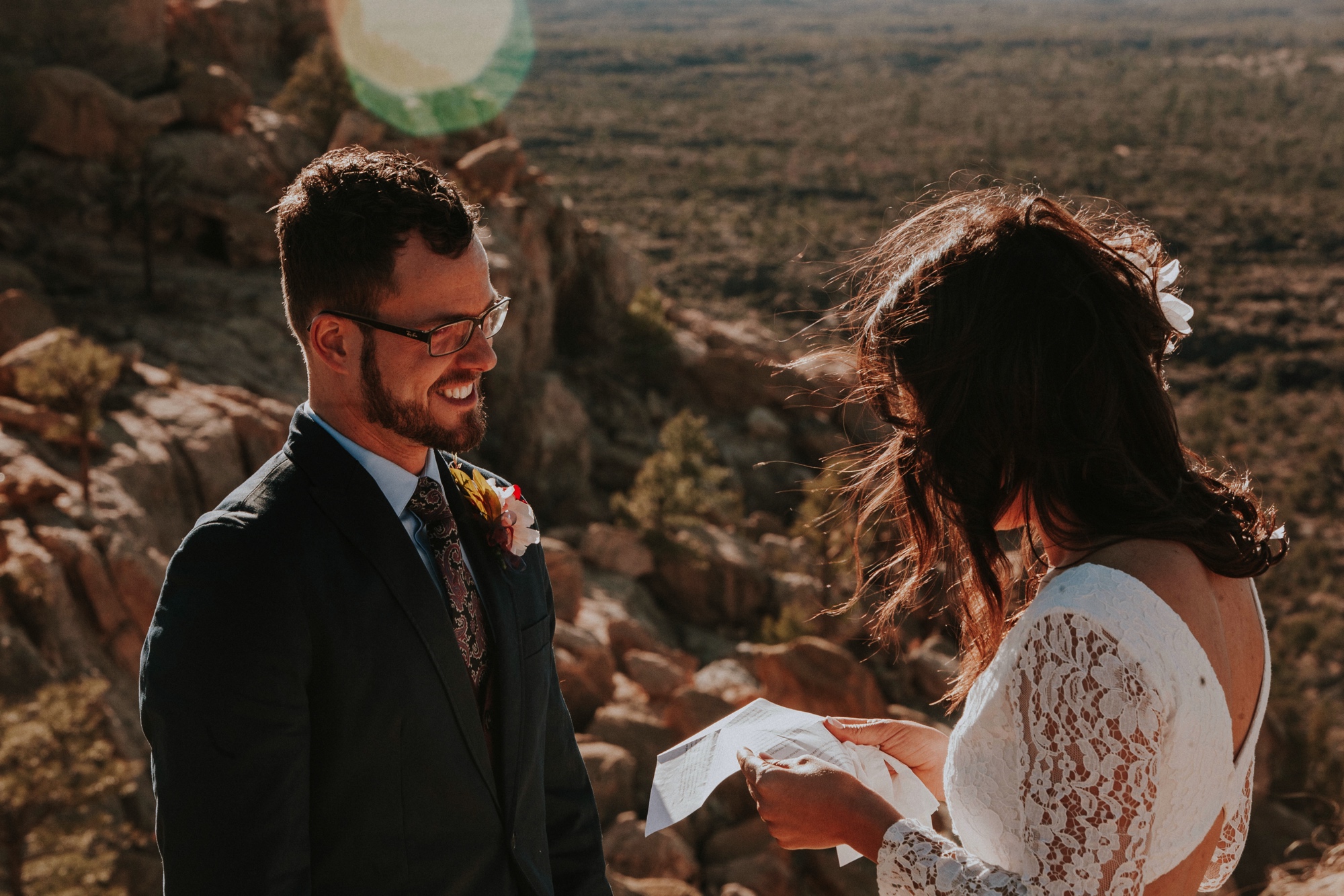  Jade and Alex eloped at the amazing and scenic El Malpais National Monument outside of Grants, New Mexico. It was a beautiful November day and the weather was crisp, fresh, and just a tad chilly, but it didn’t get in the way of their fabulous weddin