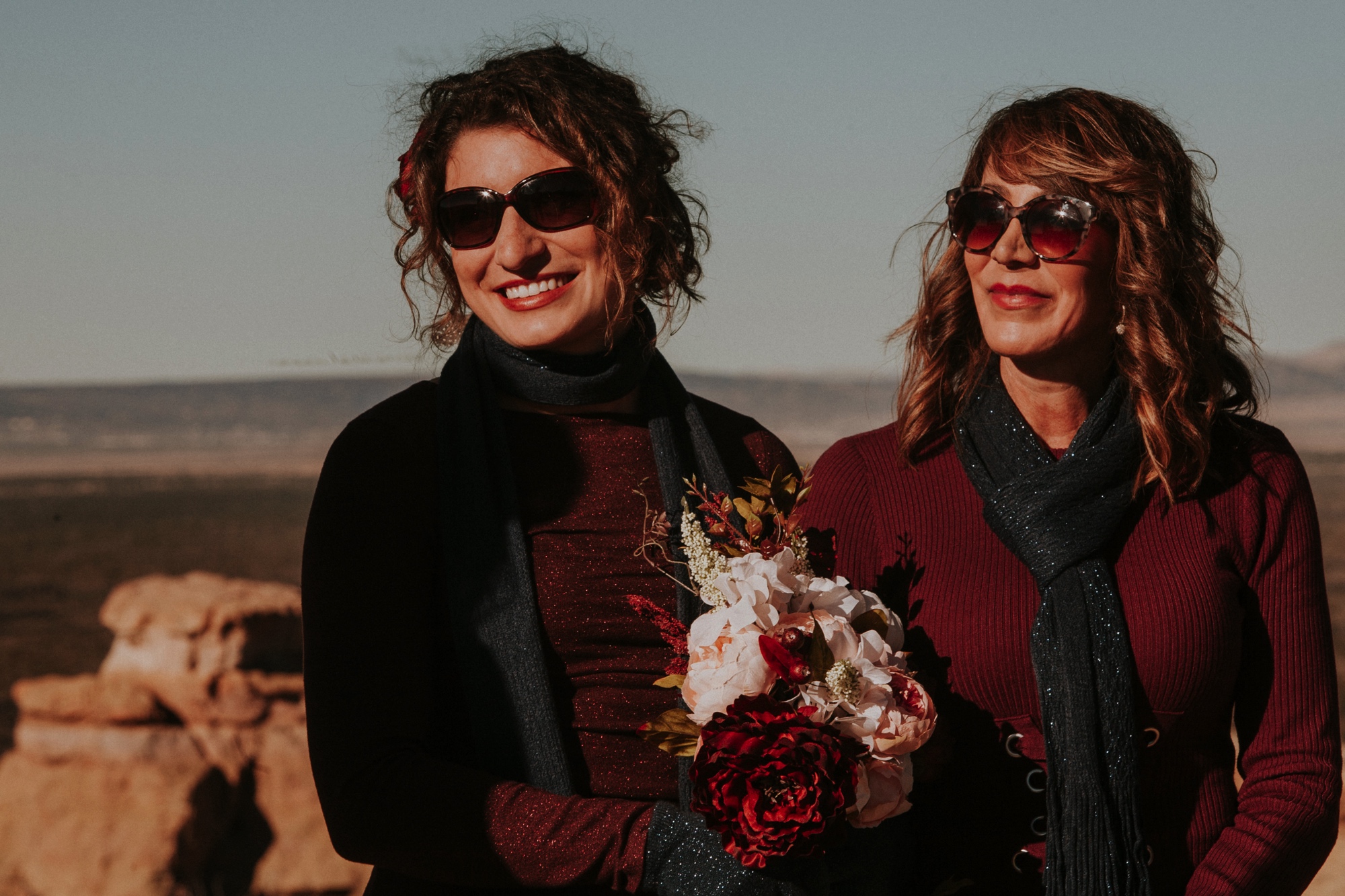  Jade and Alex eloped at the amazing and scenic El Malpais National Monument outside of Grants, New Mexico. It was a beautiful November day and the weather was crisp, fresh, and just a tad chilly, but it didn’t get in the way of their fabulous weddin