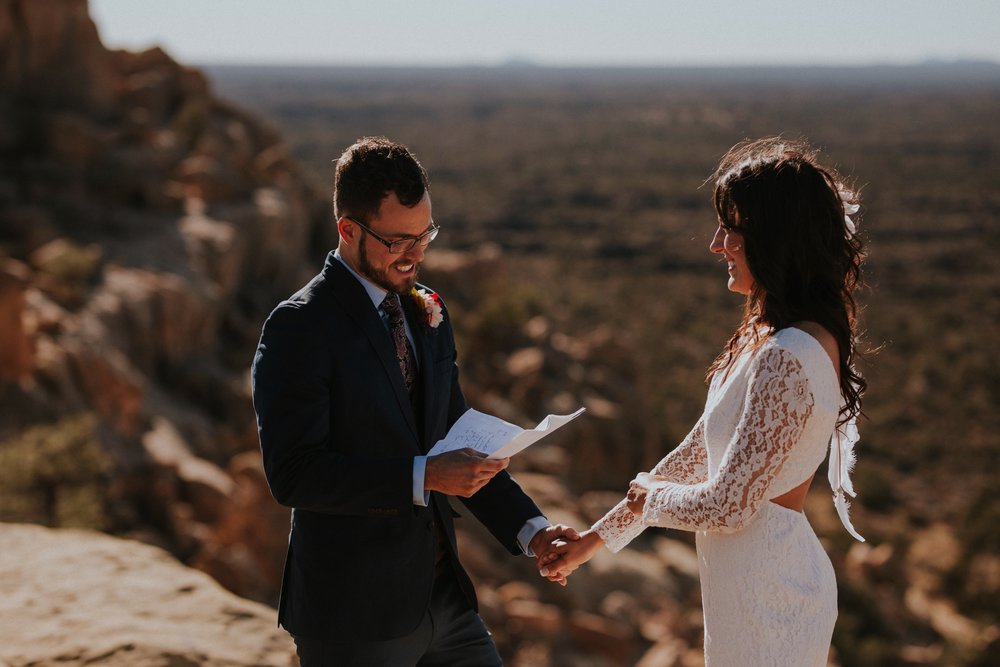  Jade and Alex eloped at the amazing and scenic El Malpais National Monument outside of Grants, New Mexico. It was a beautiful November day and the weather was crisp, fresh, and just a tad chilly, but it didn’t get in the way of their fabulous weddin