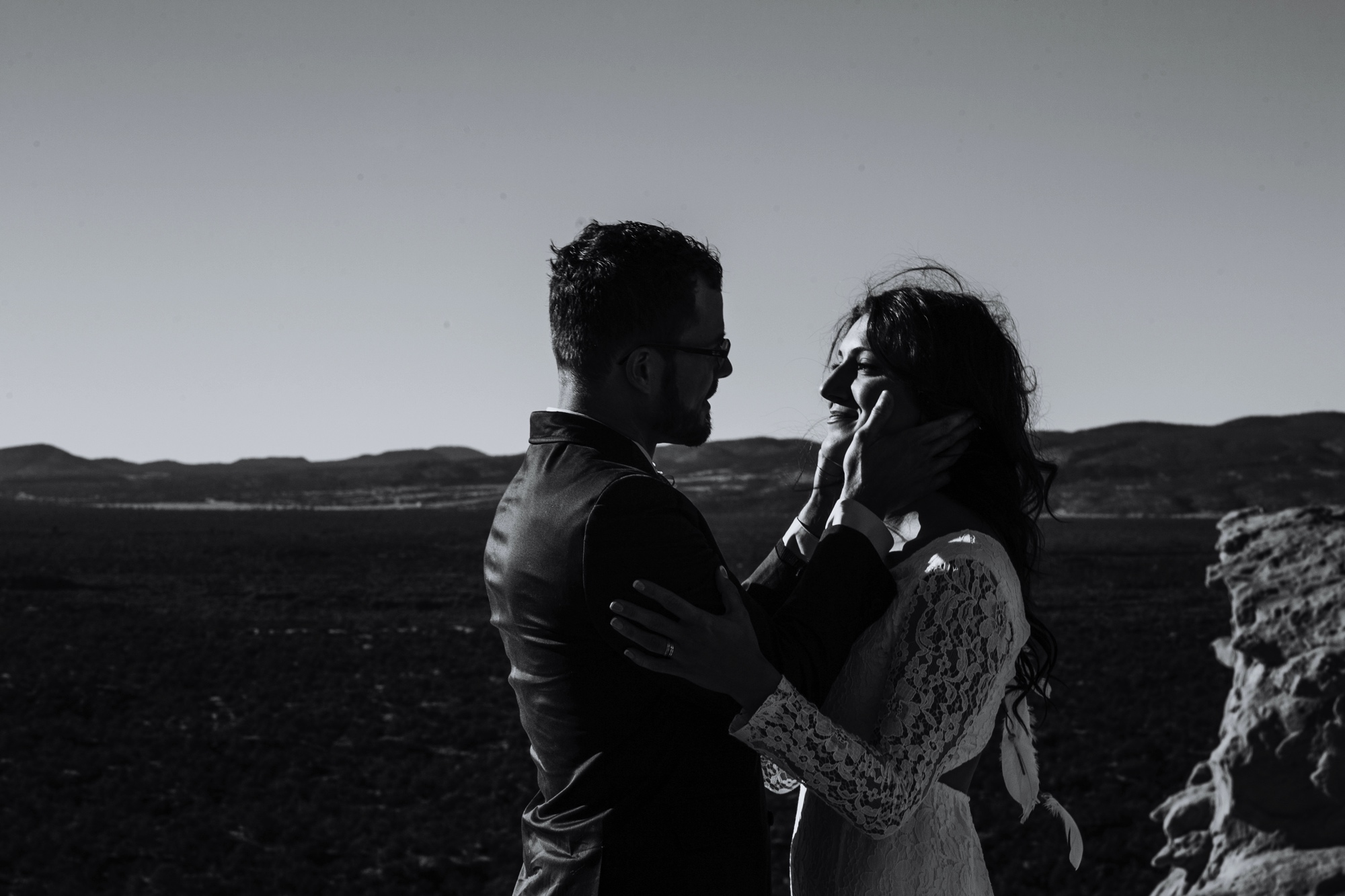  Jade and Alex eloped at the amazing and scenic El Malpais National Monument outside of Grants, New Mexico. It was a beautiful November day and the weather was crisp, fresh, and just a tad chilly, but it didn’t get in the way of their fabulous weddin