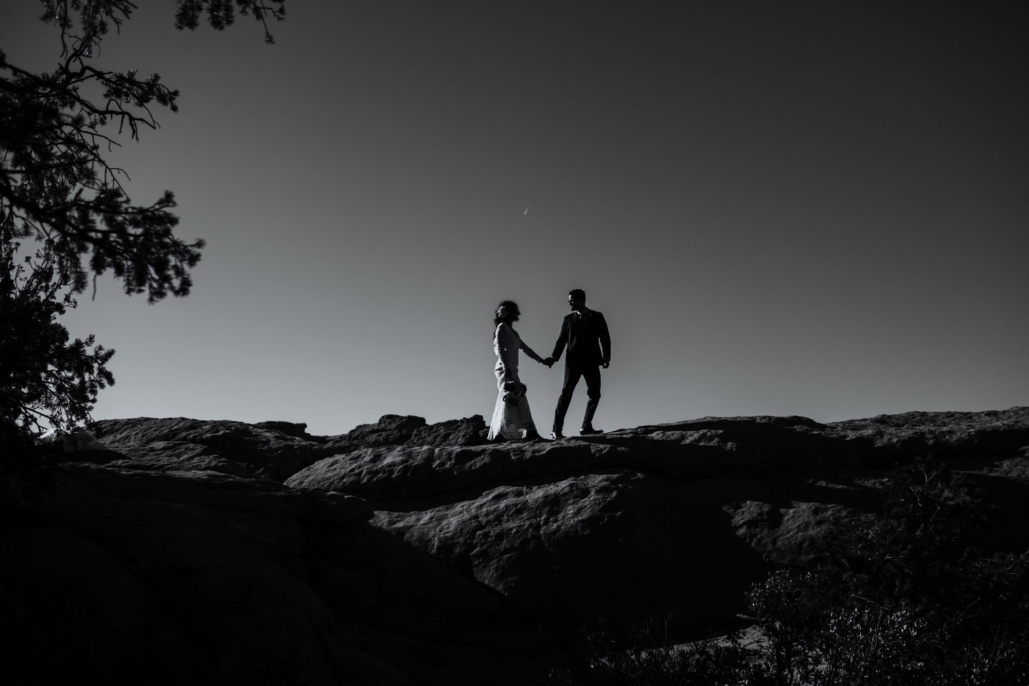  Jade and Alex eloped at the amazing and scenic El Malpais National Monument outside of Grants, New Mexico. It was a beautiful November day and the weather was crisp, fresh, and just a tad chilly, but it didn’t get in the way of their fabulous weddin