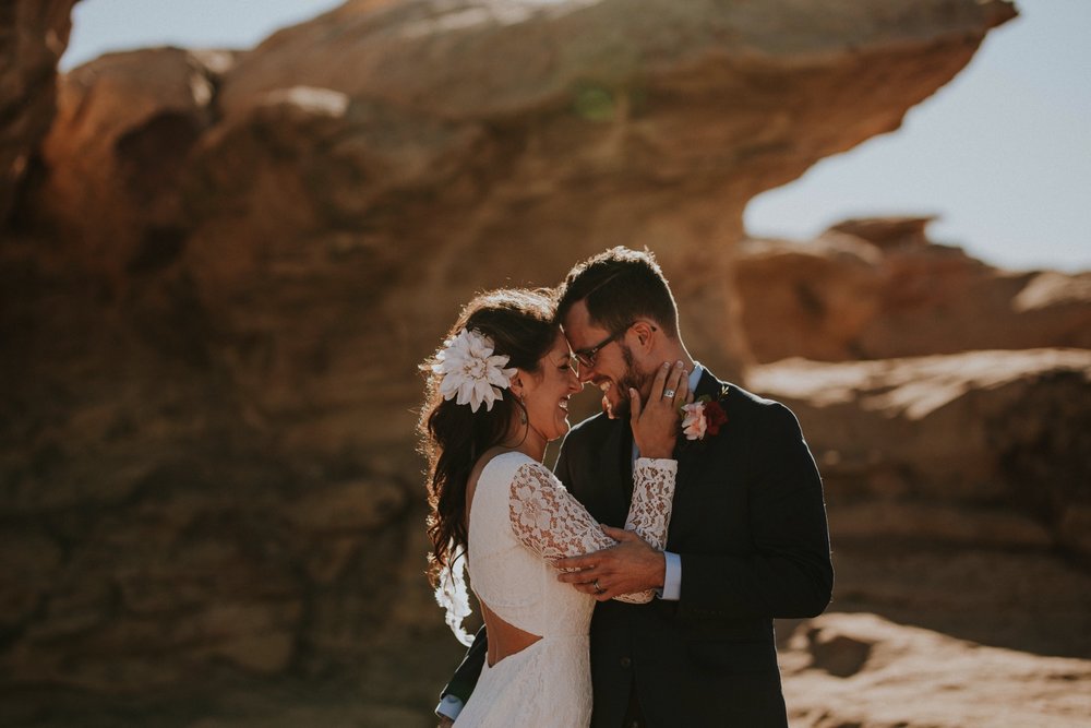  Jade and Alex eloped at the amazing and scenic El Malpais National Monument outside of Grants, New Mexico. It was a beautiful November day and the weather was crisp, fresh, and just a tad chilly, but it didn’t get in the way of their fabulous weddin