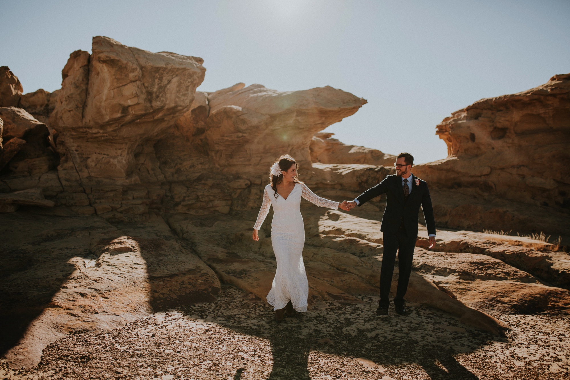  Jade and Alex eloped at the amazing and scenic El Malpais National Monument outside of Grants, New Mexico. It was a beautiful November day and the weather was crisp, fresh, and just a tad chilly, but it didn’t get in the way of their fabulous weddin