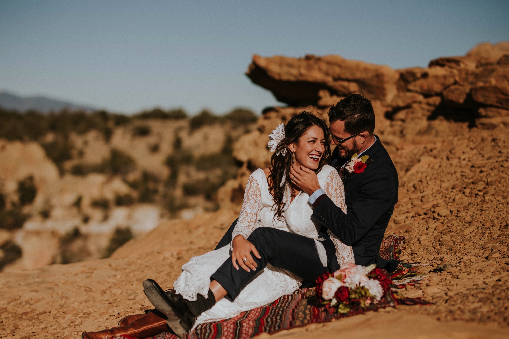  Jade and Alex eloped at the amazing and scenic El Malpais National Monument outside of Grants, New Mexico. It was a beautiful November day and the weather was crisp, fresh, and just a tad chilly, but it didn’t get in the way of their fabulous weddin