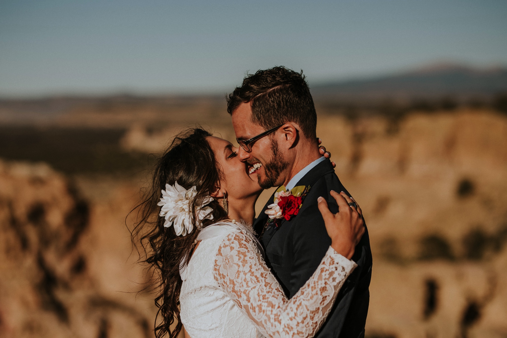  Jade and Alex eloped at the amazing and scenic El Malpais National Monument outside of Grants, New Mexico. It was a beautiful November day and the weather was crisp, fresh, and just a tad chilly, but it didn’t get in the way of their fabulous weddin