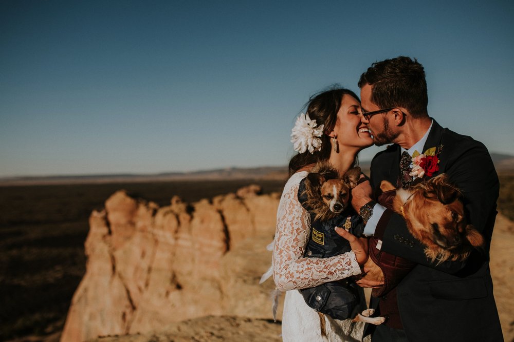  Jade and Alex eloped at the amazing and scenic El Malpais National Monument outside of Grants, New Mexico. It was a beautiful November day and the weather was crisp, fresh, and just a tad chilly, but it didn’t get in the way of their fabulous weddin