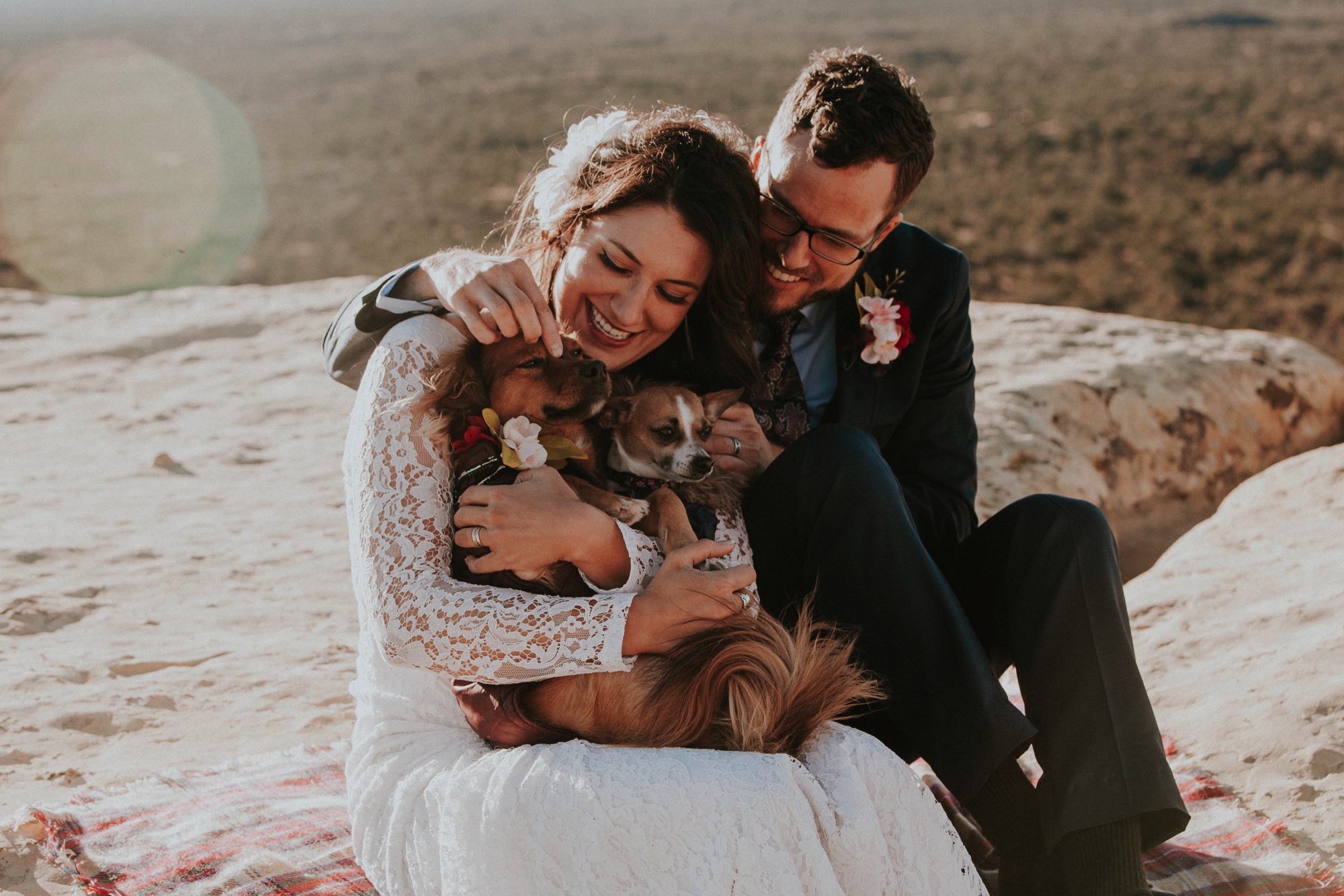  Jade and Alex eloped at the amazing and scenic El Malpais National Monument outside of Grants, New Mexico. It was a beautiful November day and the weather was crisp, fresh, and just a tad chilly, but it didn’t get in the way of their fabulous weddin