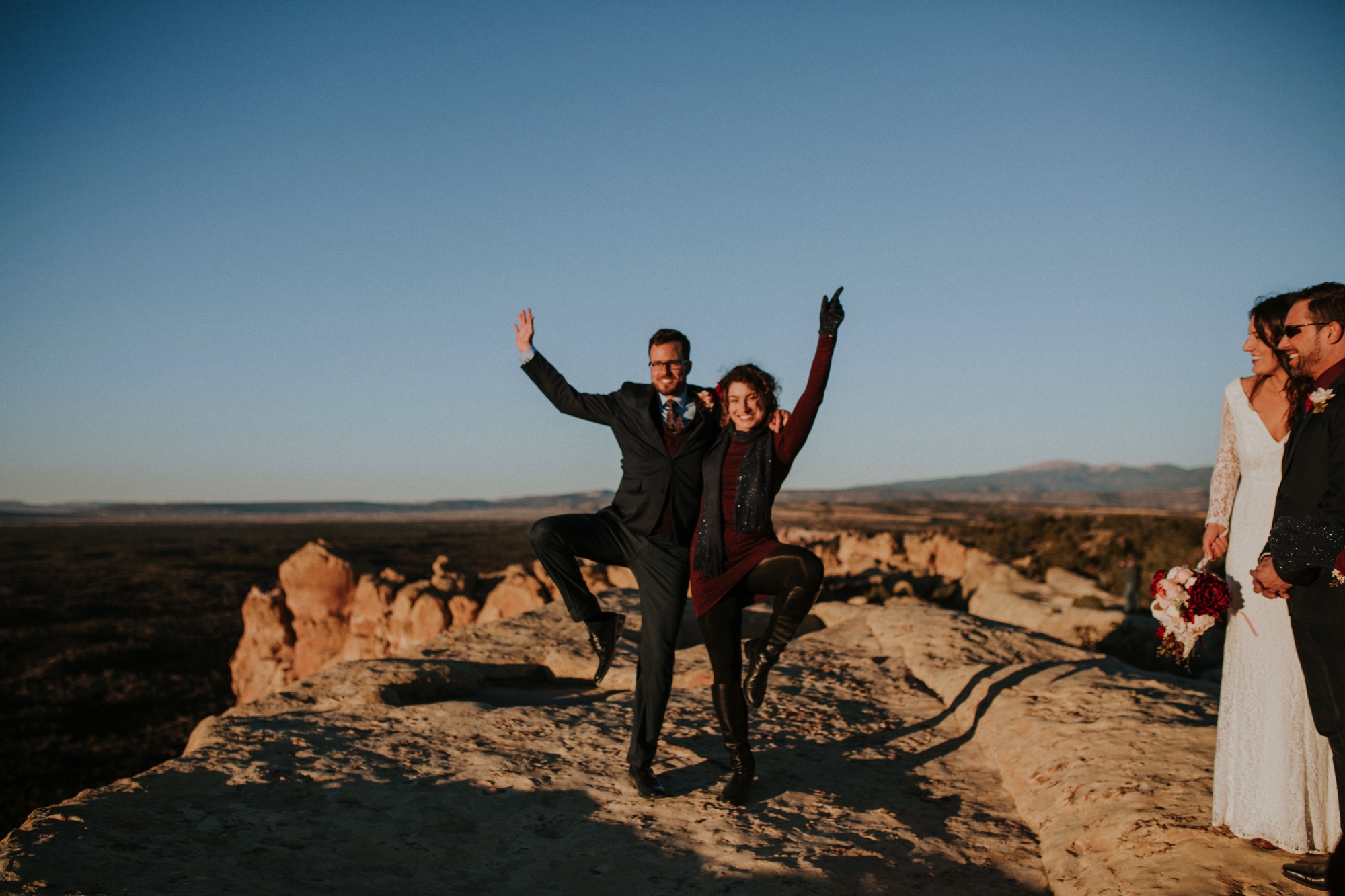  Jade and Alex eloped at the amazing and scenic El Malpais National Monument outside of Grants, New Mexico. It was a beautiful November day and the weather was crisp, fresh, and just a tad chilly, but it didn’t get in the way of their fabulous weddin