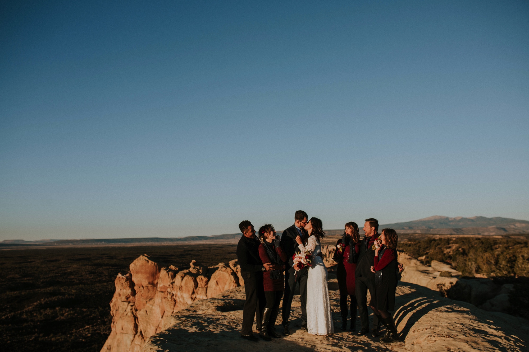  Jade and Alex eloped at the amazing and scenic El Malpais National Monument outside of Grants, New Mexico. It was a beautiful November day and the weather was crisp, fresh, and just a tad chilly, but it didn’t get in the way of their fabulous weddin