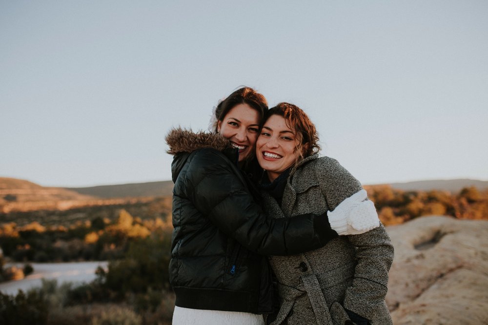  Jade and Alex eloped at the amazing and scenic El Malpais National Monument outside of Grants, New Mexico. It was a beautiful November day and the weather was crisp, fresh, and just a tad chilly, but it didn’t get in the way of their fabulous weddin