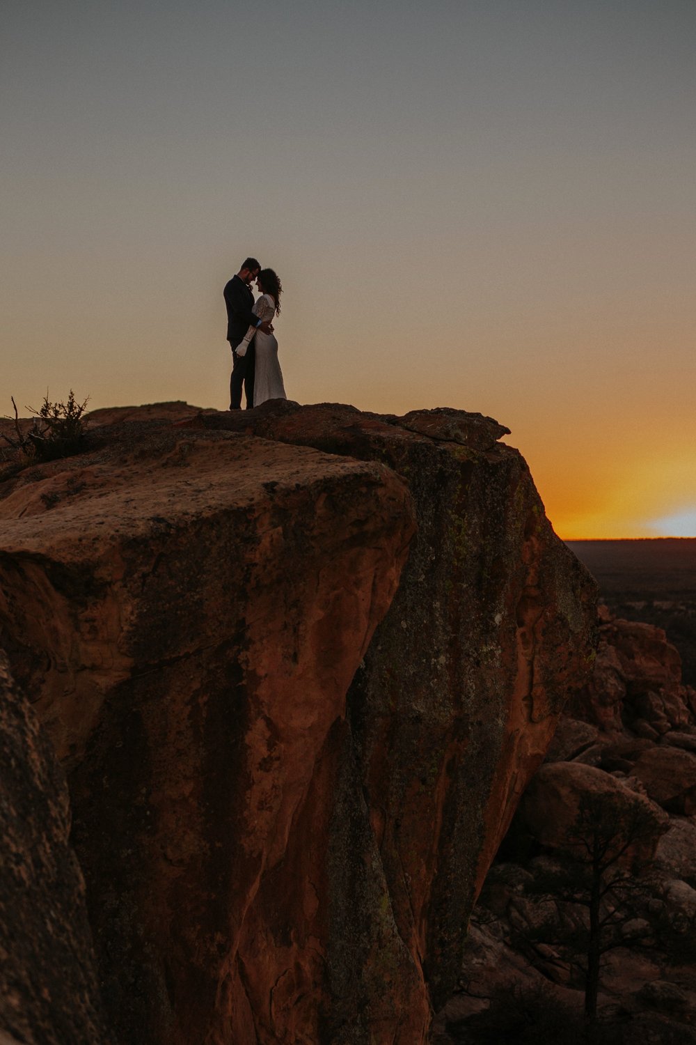  Jade and Alex eloped at the amazing and scenic El Malpais National Monument outside of Grants, New Mexico. It was a beautiful November day and the weather was crisp, fresh, and just a tad chilly, but it didn’t get in the way of their fabulous weddin