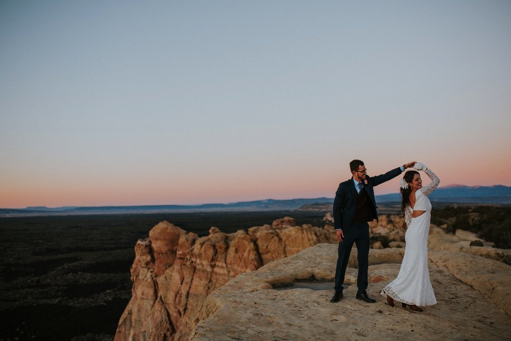  Jade and Alex eloped at the amazing and scenic El Malpais National Monument outside of Grants, New Mexico. It was a beautiful November day and the weather was crisp, fresh, and just a tad chilly, but it didn’t get in the way of their fabulous weddin