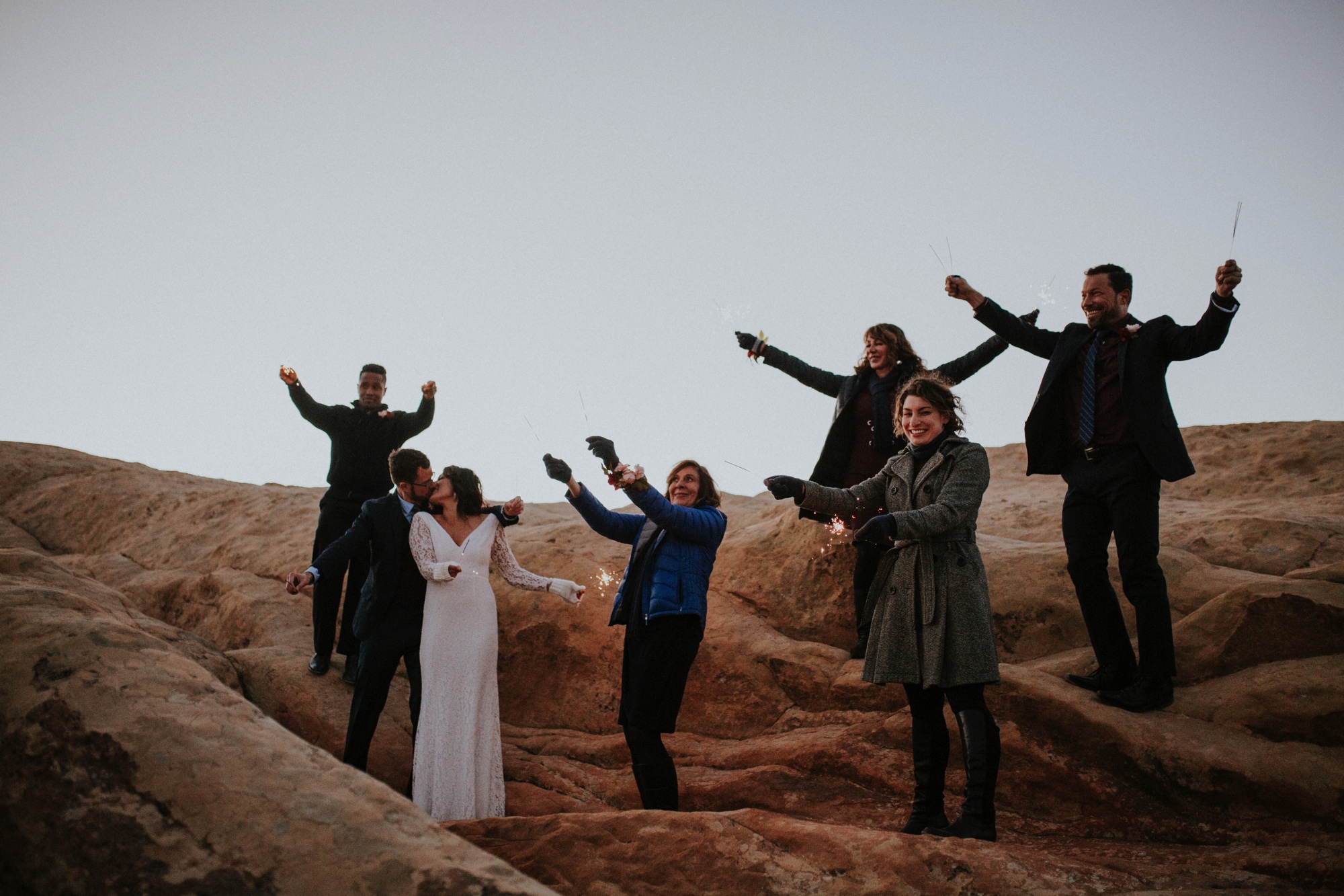  Jade and Alex eloped at the amazing and scenic El Malpais National Monument outside of Grants, New Mexico. It was a beautiful November day and the weather was crisp, fresh, and just a tad chilly, but it didn’t get in the way of their fabulous weddin