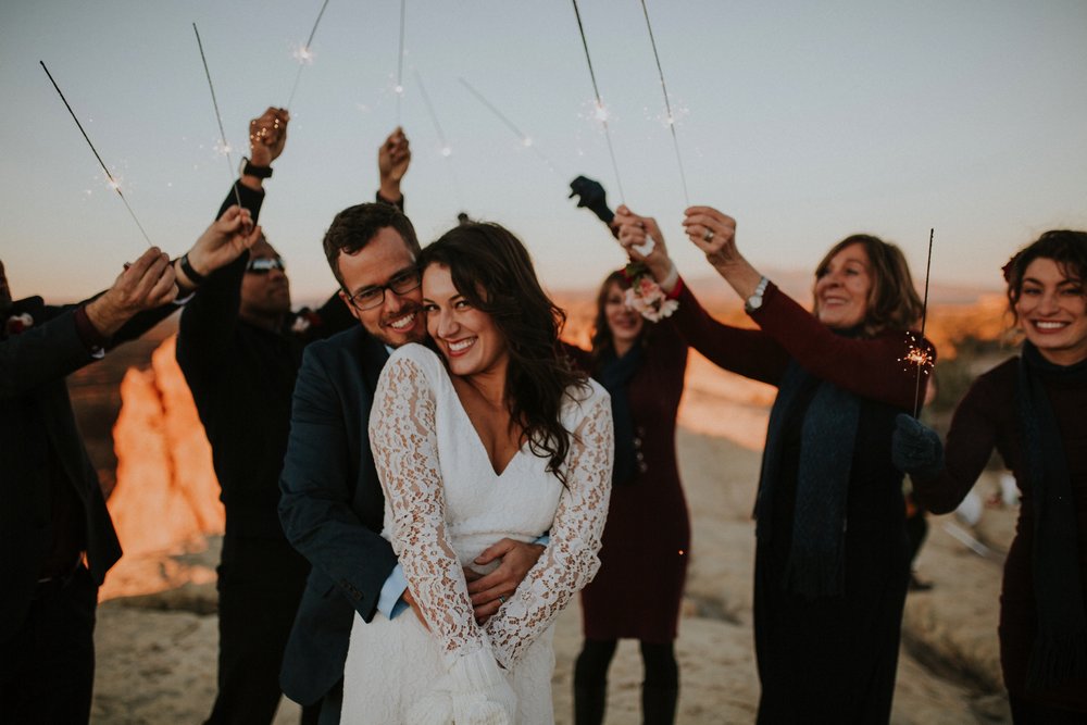  Jade and Alex eloped at the amazing and scenic El Malpais National Monument outside of Grants, New Mexico. It was a beautiful November day and the weather was crisp, fresh, and just a tad chilly, but it didn’t get in the way of their fabulous weddin