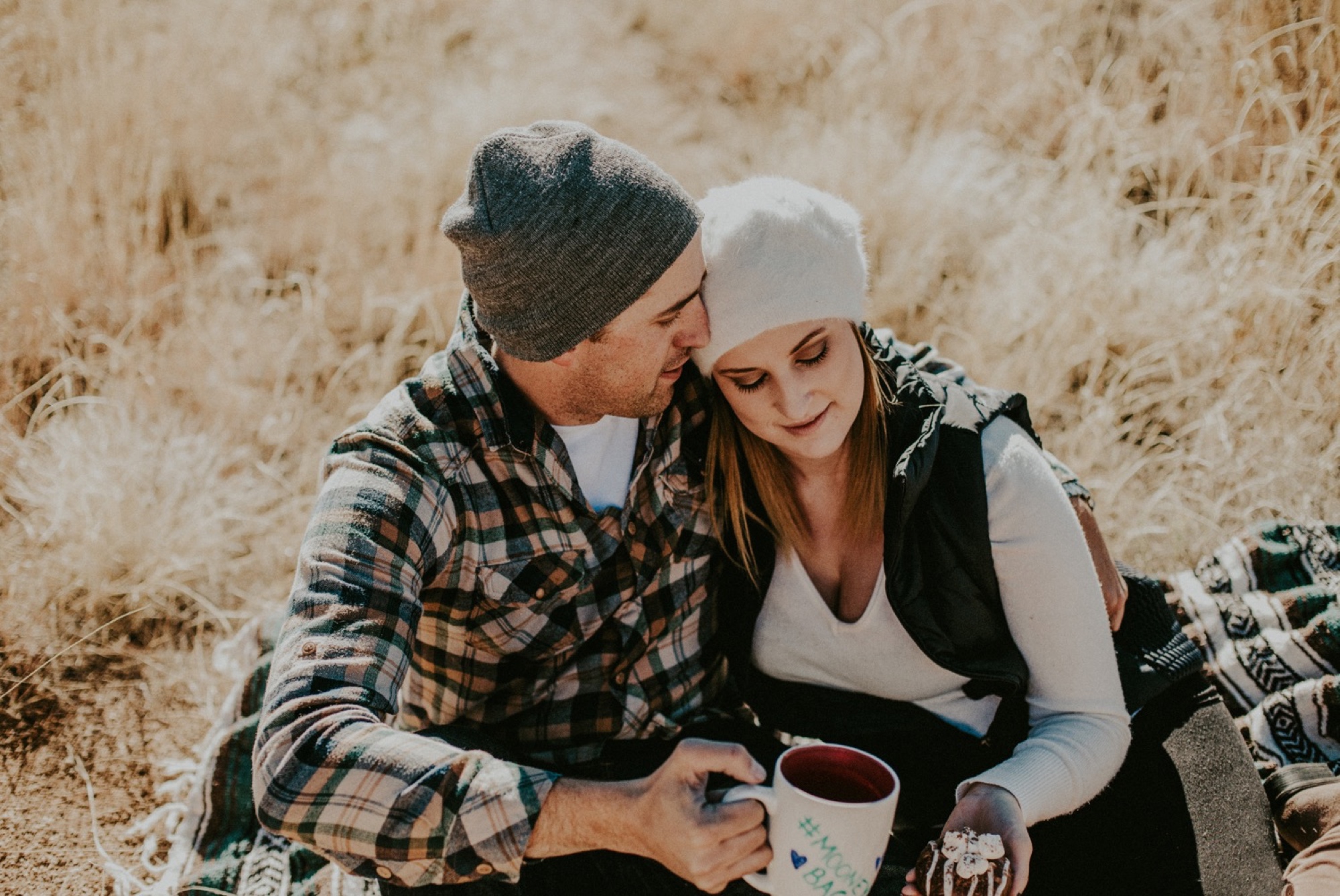  We took a drive to the Sandia Rockhouse to capture Chris and Kymbrye’s beautiful engagement photos in Albuquerque, New Mexico. Chris and Kymbrye brought some serious cuteness for their epic engagement session! I love the rustic, cozy theme they chos