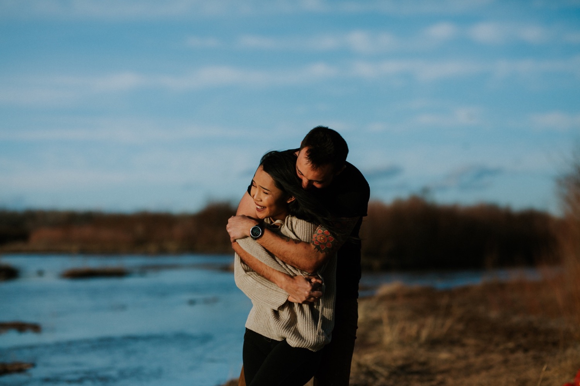  I loved working with Xamie and Nate on this incredible couples portrait session at the Alameda Bosque Open Space in Albuquerque, New Mexico. Our session started off with grey overcast skies that made for some moody portraits! Xamie and Nate’s outfit