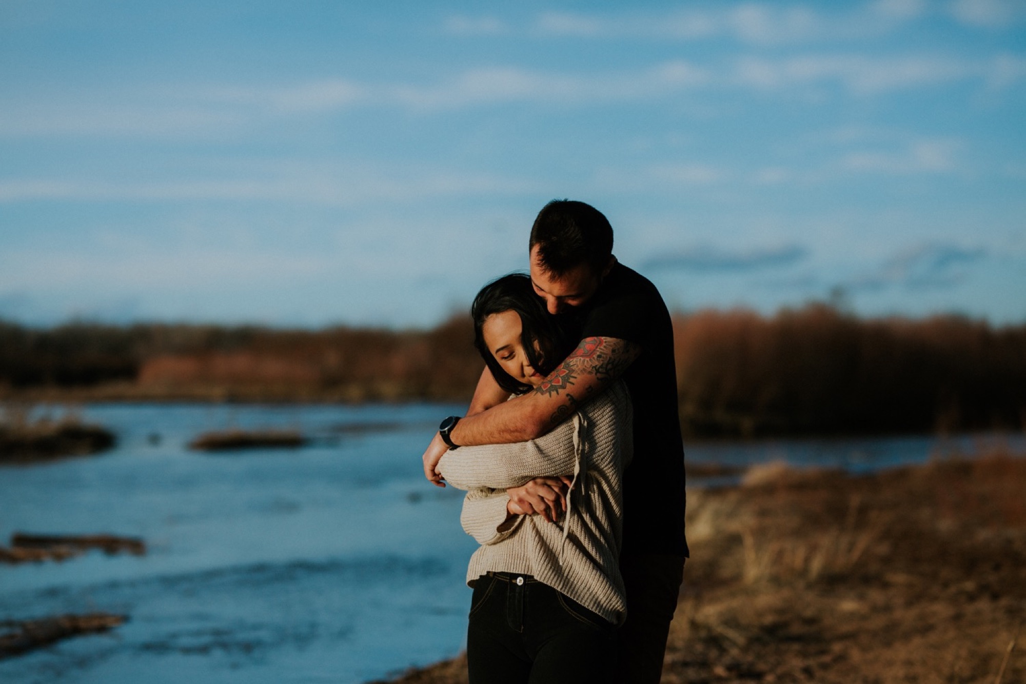  I loved working with Xamie and Nate on this incredible couples portrait session at the Alameda Bosque Open Space in Albuquerque, New Mexico. Our session started off with grey overcast skies that made for some moody portraits! Xamie and Nate’s outfit