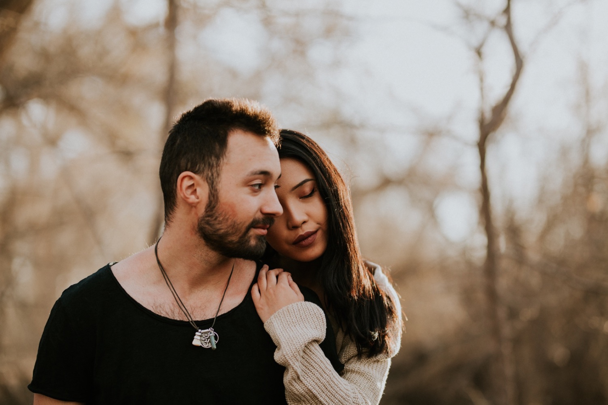  I loved working with Xamie and Nate on this incredible couples portrait session at the Alameda Bosque Open Space in Albuquerque, New Mexico. Our session started off with grey overcast skies that made for some moody portraits! Xamie and Nate’s outfit