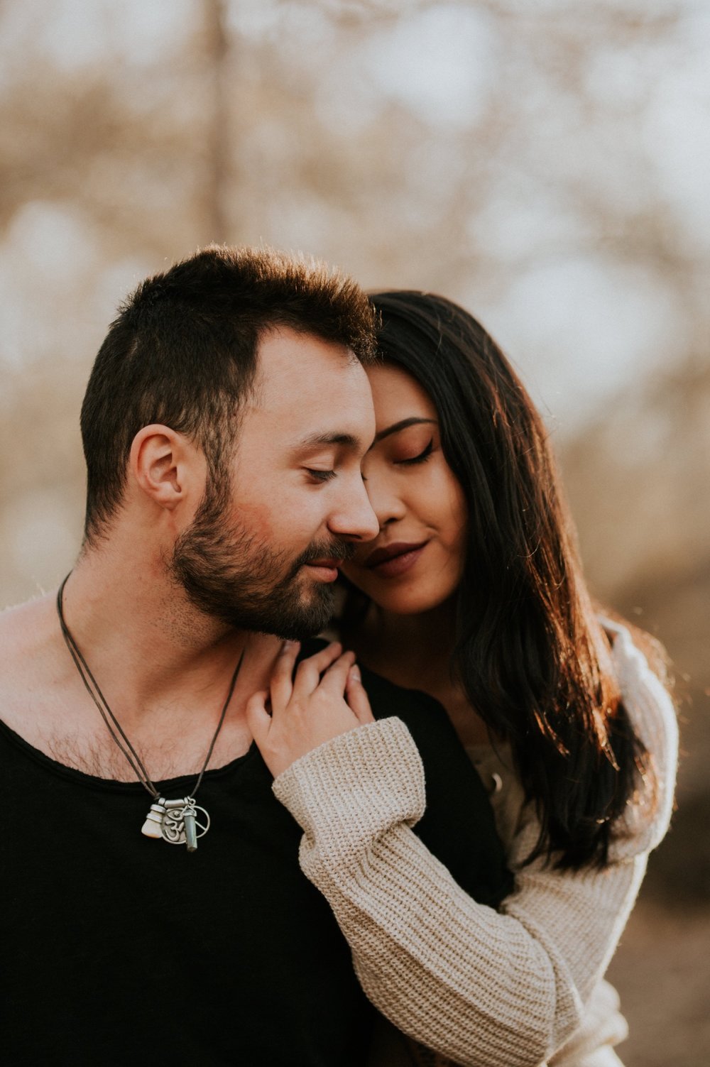  I loved working with Xamie and Nate on this incredible couples portrait session at the Alameda Bosque Open Space in Albuquerque, New Mexico. Our session started off with grey overcast skies that made for some moody portraits! Xamie and Nate’s outfit