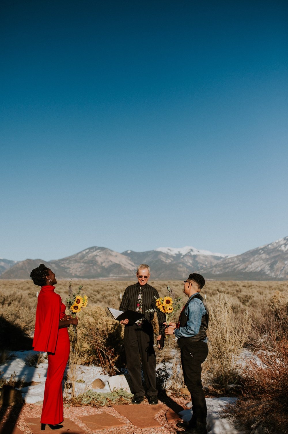  SO excited to share B + E’s gorgeous l winter elopement in Taos, New Mexico. Their outfits were a hodgepodge of things B + E already owned, homemade accessories, vintage hand me downs, and contemporary pieces they bought special for their big day. W