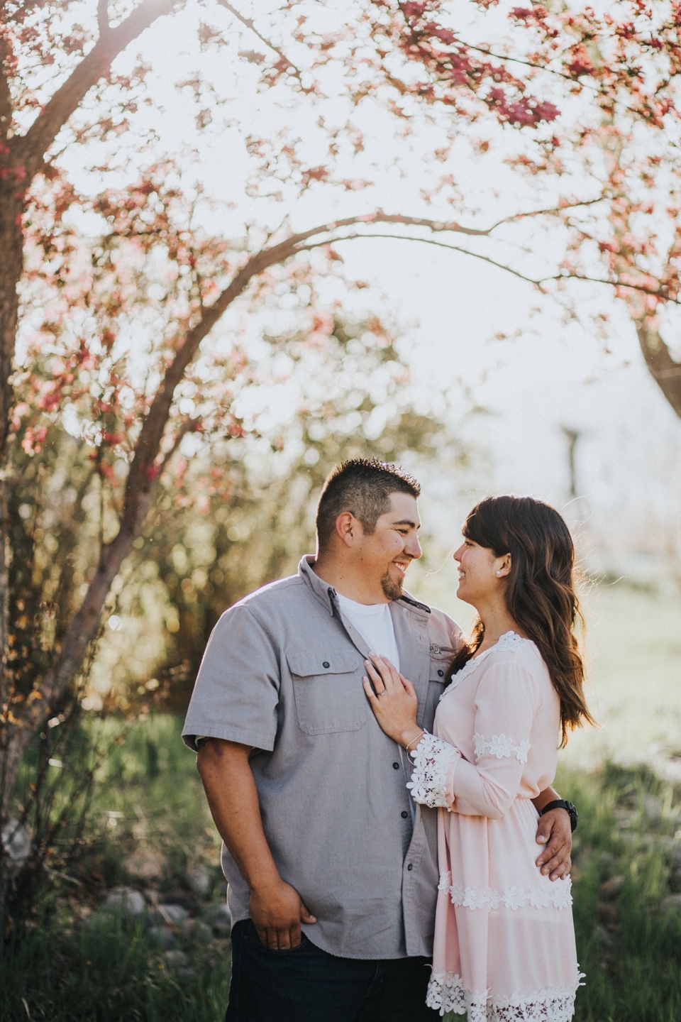 Spring in Taos, New Mexico is out of this world beautiful (especially because sometimes spring starts late due to the snow!). Mother Nature blessed us with a gorgeous spring morning for Jenea and Daniel’s sunrise engagement session in Taos, New Mexico. The morning light rising above the Sangre de Cristo mountains is a beautiful sight to see especially from Overland Sheepskin Co. in Taos, New Mexico…