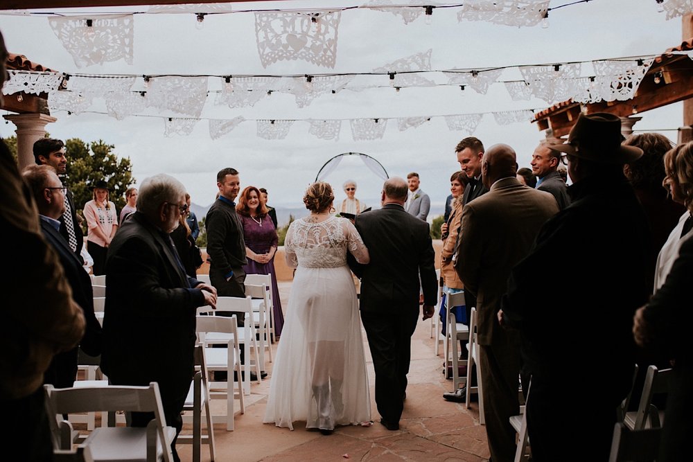  Ariel and Jack had a beautiful, intimate wedding at the ever so lovely Hacienda Doña Andrea de Santa Fe in Cerrillos, New Mexico (just outside of Santa Fe, New Mexico). If you have never been to Hacienda Doña Andrea de Santa Fe, it is beyond worth c