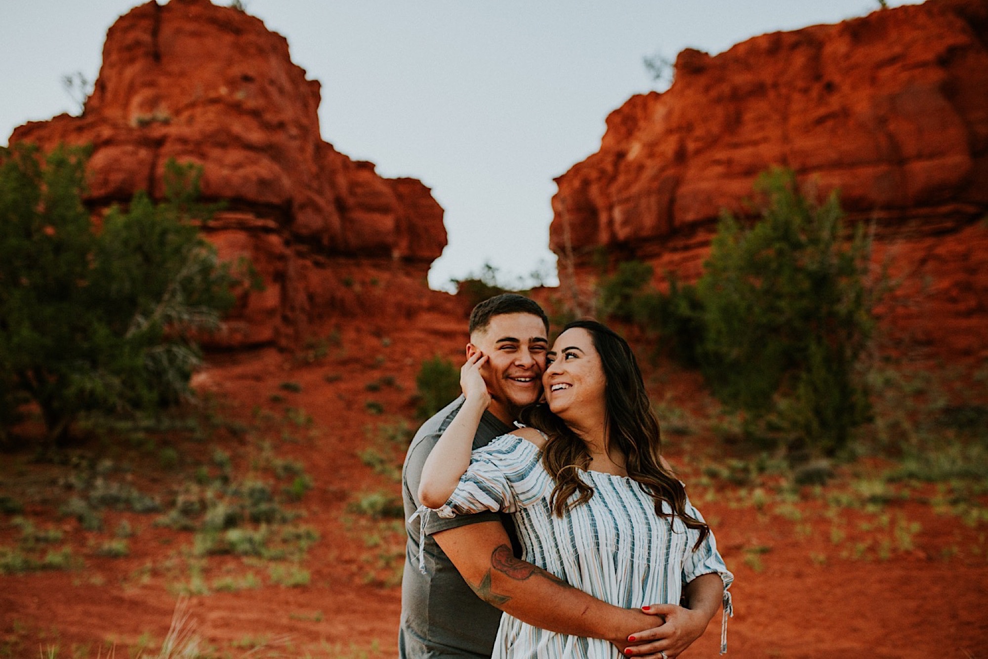  We went on a road trip for Kayla and Dillan’s summer engagement photos at the Jemez Red Rocks in Jemez, New Mexico. There are awesome forest-y areas in Jemez Springs that creates a stunning backdrop of beautiful greenery for gorgeous engagement phot