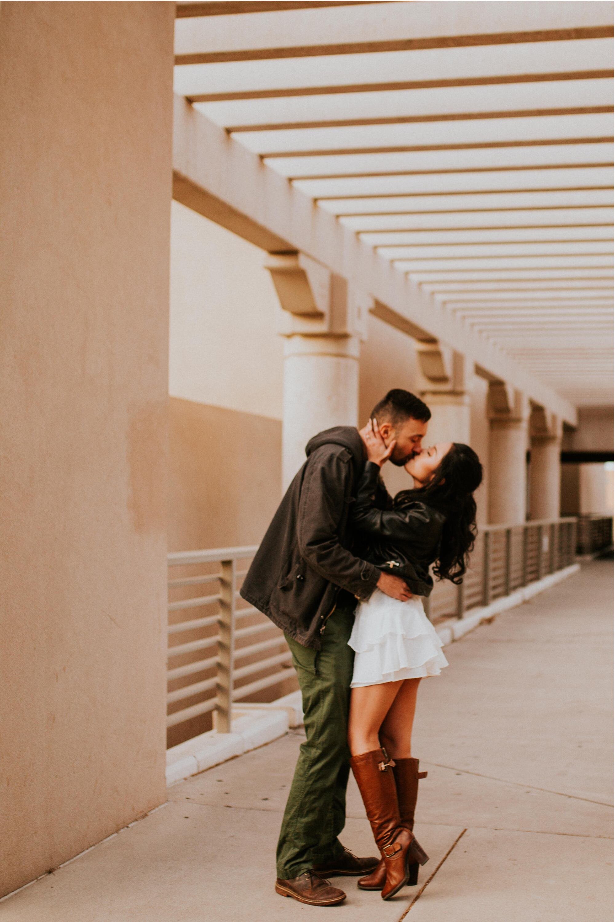  Xamie and Nate’s engagement photos at the University of New Mexico Main Campus in Albuquerque, New Mexico was truly fabulous! Exploring the UNM Campus and taking the cutest New Years Eve engagement photos of Xamie and Nate was the perfect way to end