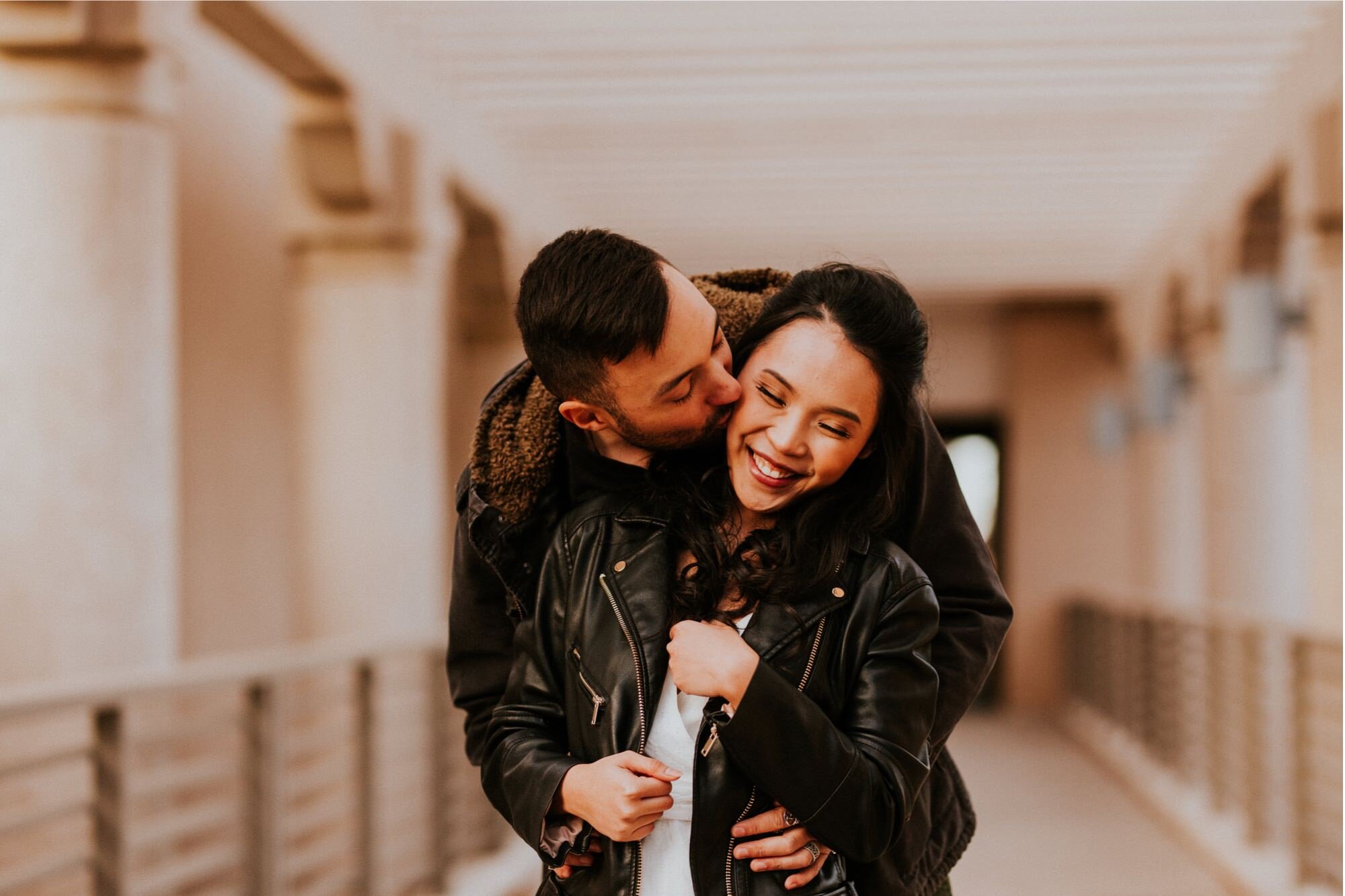  Xamie and Nate’s engagement photos at the University of New Mexico Main Campus in Albuquerque, New Mexico was truly fabulous! Exploring the UNM Campus and taking the cutest New Years Eve engagement photos of Xamie and Nate was the perfect way to end