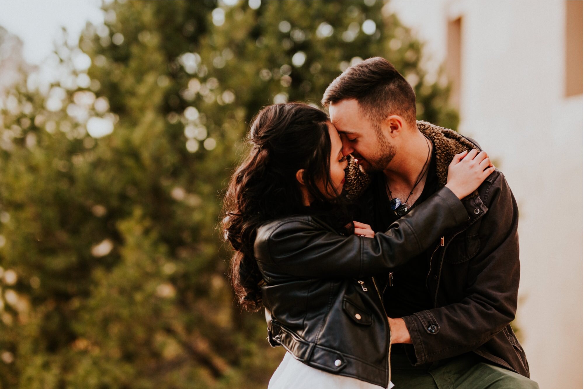  Xamie and Nate’s engagement photos at the University of New Mexico Main Campus in Albuquerque, New Mexico was truly fabulous! Exploring the UNM Campus and taking the cutest New Years Eve engagement photos of Xamie and Nate was the perfect way to end