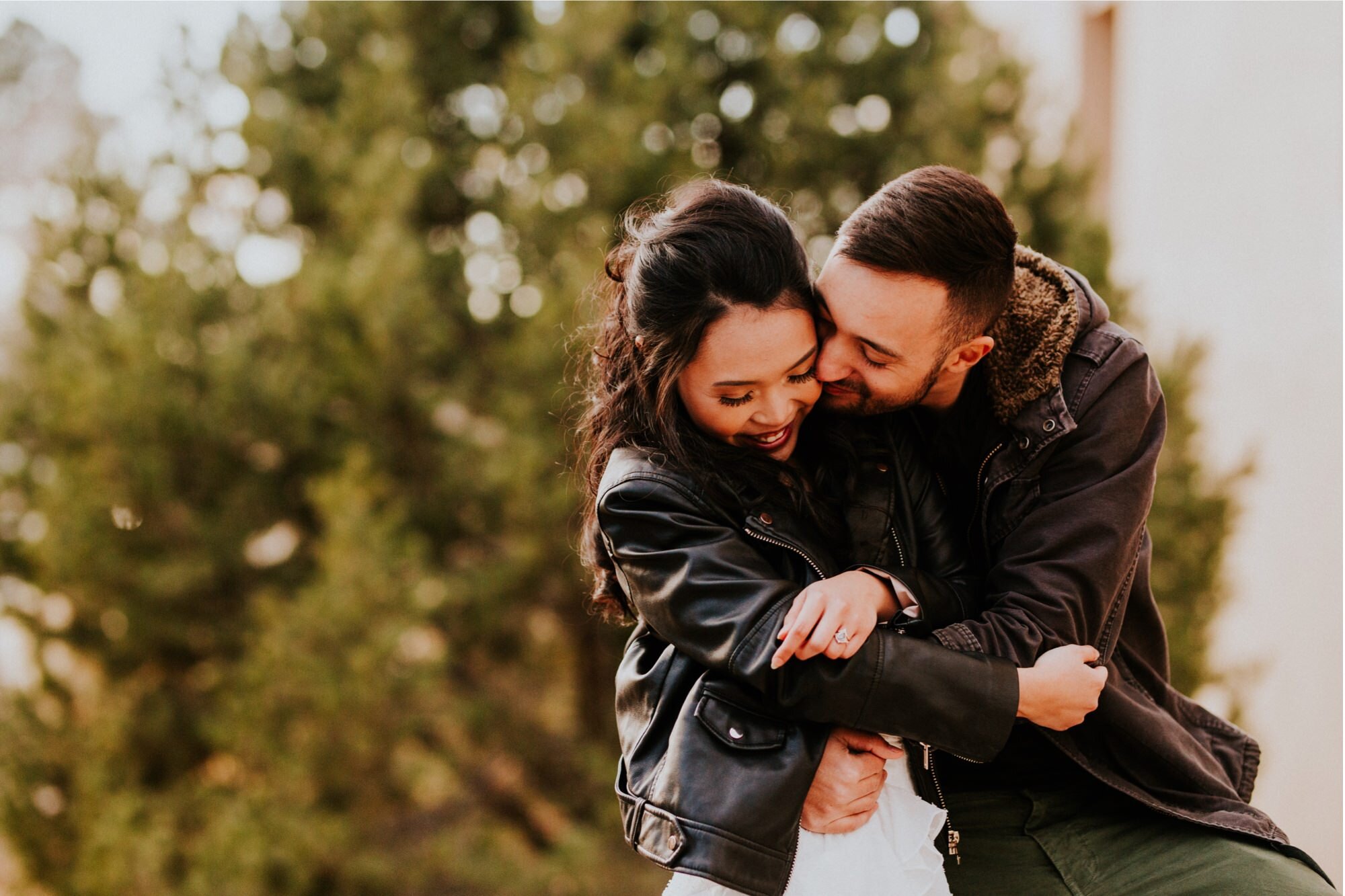  Xamie and Nate’s engagement photos at the University of New Mexico Main Campus in Albuquerque, New Mexico was truly fabulous! Exploring the UNM Campus and taking the cutest New Years Eve engagement photos of Xamie and Nate was the perfect way to end