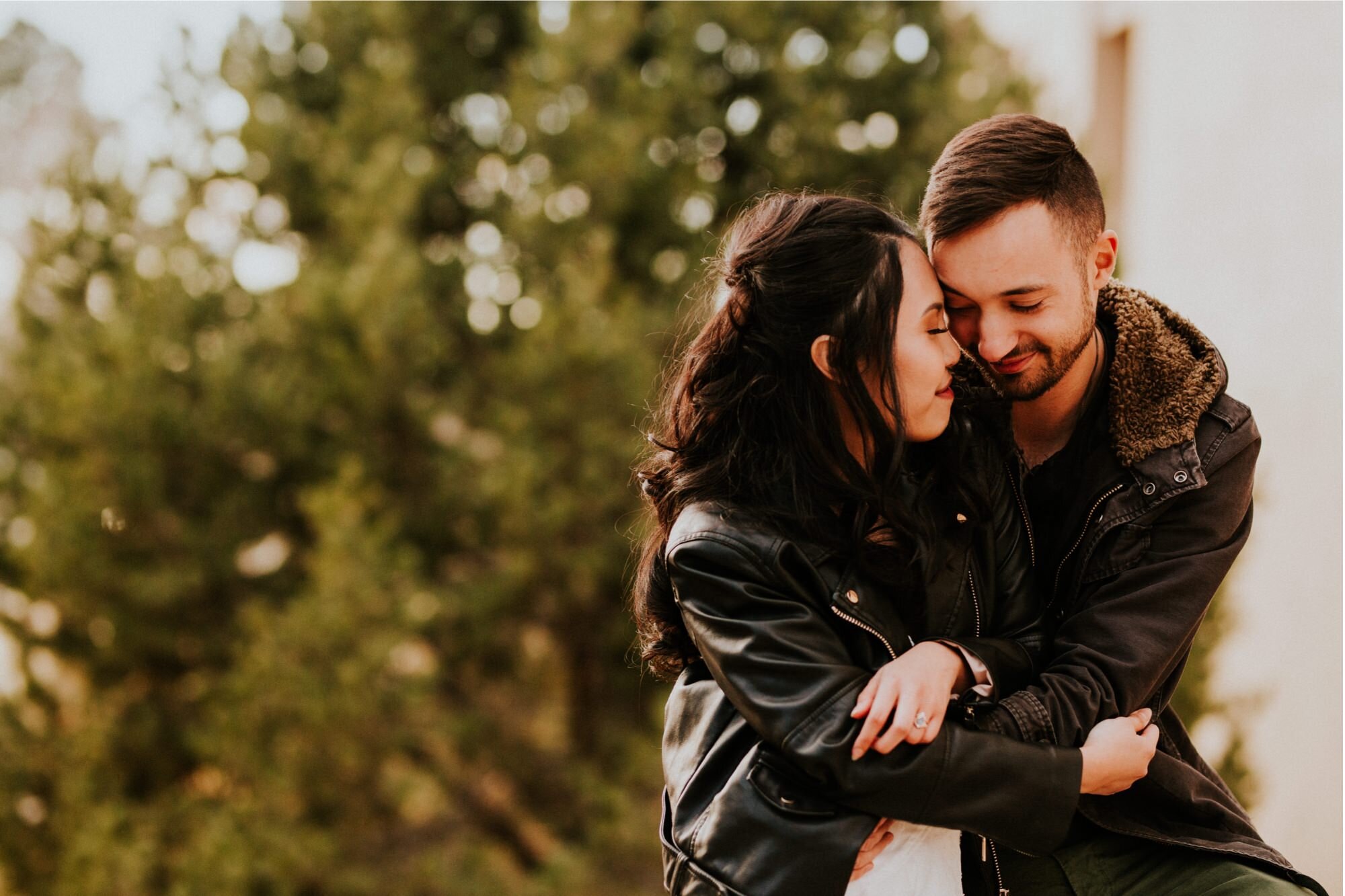  Xamie and Nate’s engagement photos at the University of New Mexico Main Campus in Albuquerque, New Mexico was truly fabulous! Exploring the UNM Campus and taking the cutest New Years Eve engagement photos of Xamie and Nate was the perfect way to end