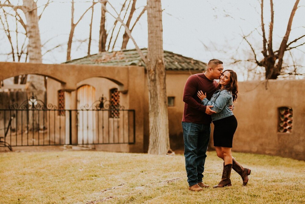  Natalie and Branden are the absolute cutest and I loved exploring through Casa Rondeña Winery in Los Ranchos de Albuquerque, New Mexico to capture their incredible winter engagement photos. I loved the black dress with denim jacket and cowboy boots 