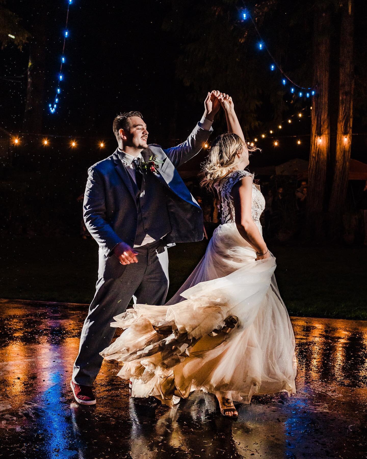 PSA: Rain on your wedding day doesn't suck. On this day the rain just didn't let up. It wasn't just a little sprinkle, either, but full on raging downpours for quite a lot of the day. These photos of Ashleigh and Austin's first dance, and Ashleigh's 