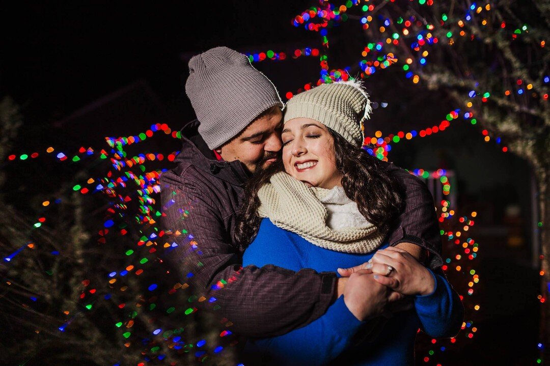 If you're having your photos taken in December, make it a priority to incorporate some of the beautiful twinkle lights around town like Kyle and Micah did! Did we freeze our tails off shooting in the dark cold of night? A little, yeah! Worth it thoug