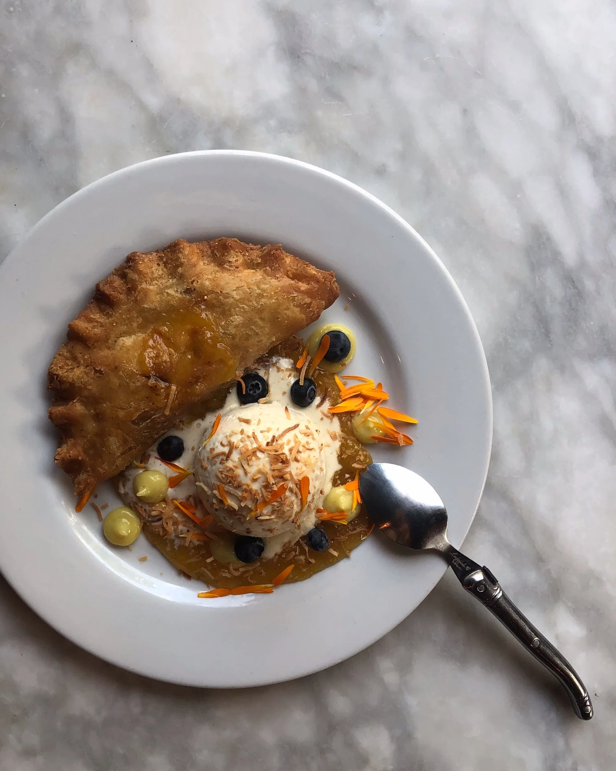 blueberry-cream cheese-cornmeal handpie • toasted coconut-cardamom ice cream • peach compote • lemongrass curd • blueberries • toasted coconut